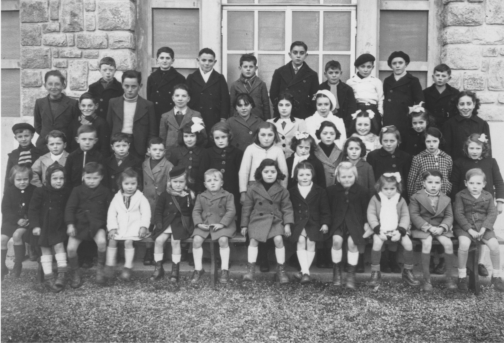 Ruth Zarnicer (third row from the front, far right) poses with her classmates in the Jeanne d'Arc convent school, where she was hiding under the name Rene Latti.