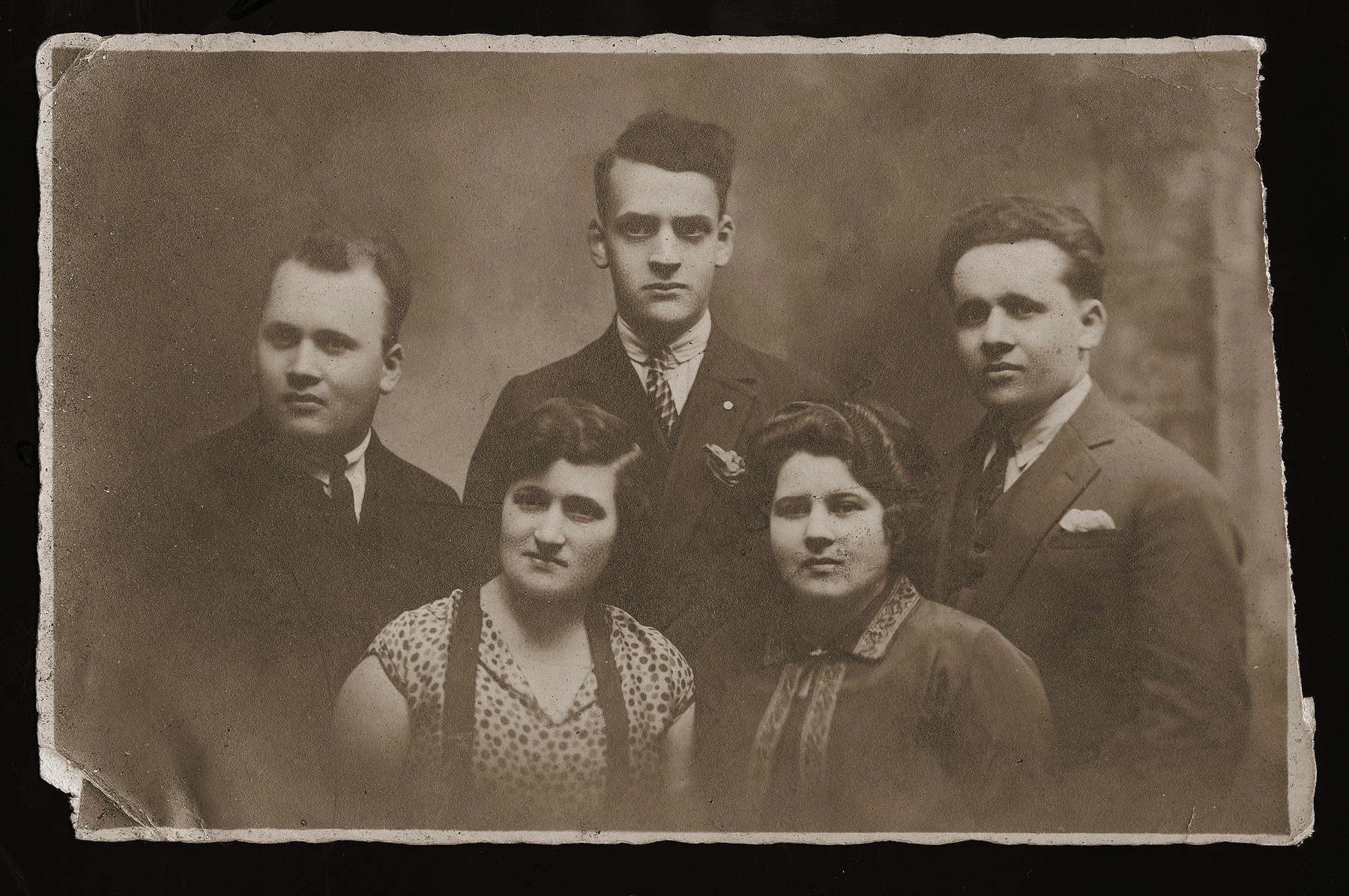 A group portrait of Polish Jews from Dabrowa, given to the donor's brother, Rubin Rozen, as a memento of his passing through Brussels on his way to the United States.