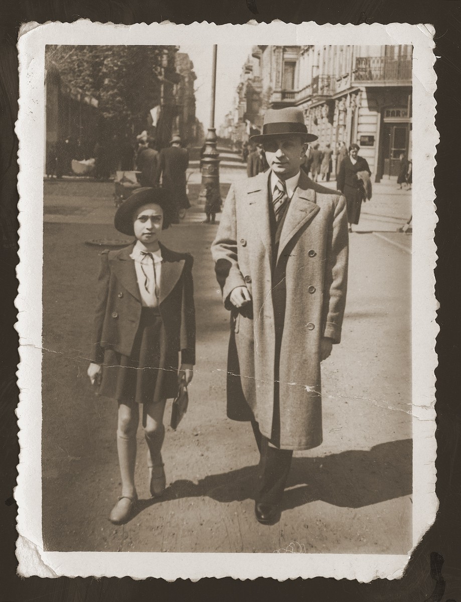 Mates Maks Bilauer, donor's future brother-in-law, walks in the street with his daughter.  

Maks met and married Rozka Rozen, the donor's older sister, in the USSR.  Maks' family perished in the Lodz ghetto.