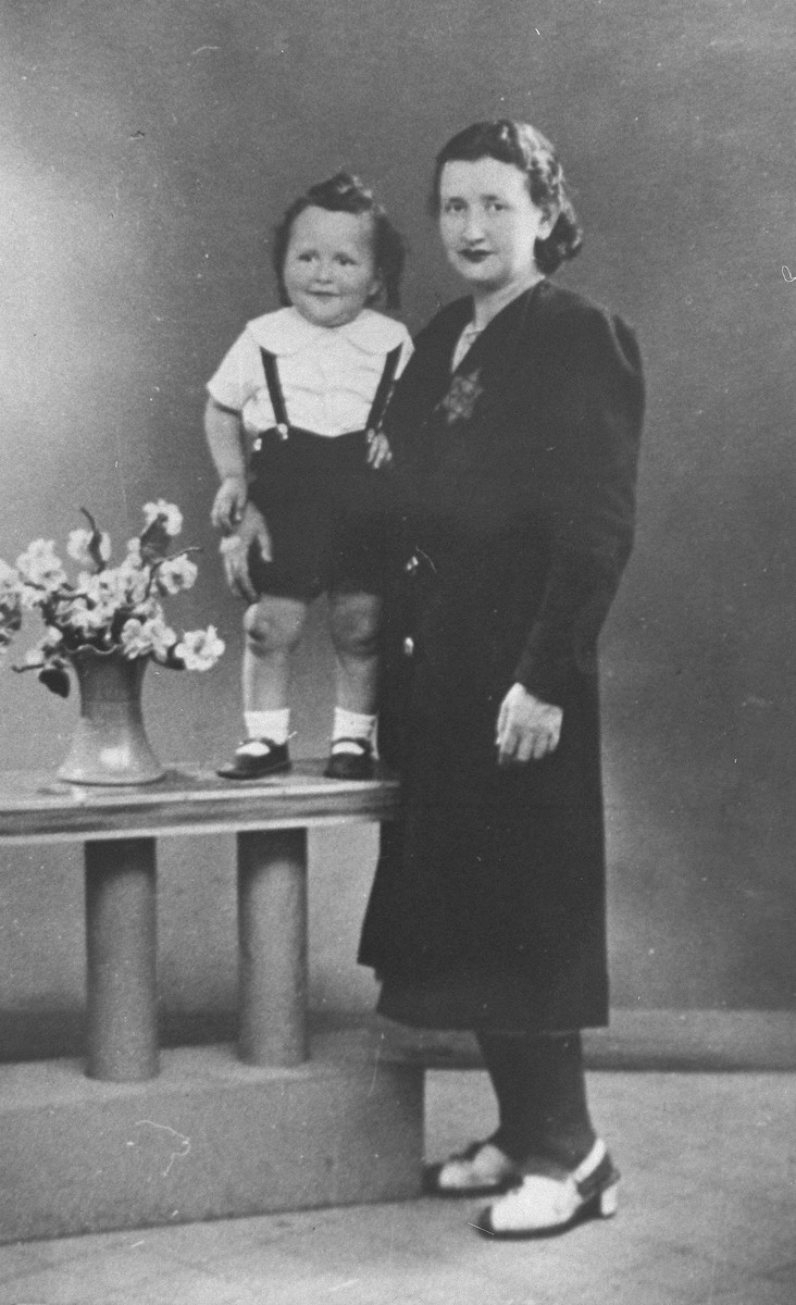 Esther Zvia Tashidler with her youngest son, Marcel.

Esther was arrested in 1942 while visiting her daughter, Rachel, at a Jewish children's home.  She was taken to Drancy and later died at an unknown location.  Marcel, who was with his mother at the time of her arrest, was hidden by a French woman who was the concierge of the building where he lived.  In 1948, Marcel, along with his brother Simon, was adopted by an Algerian Jewish family, the Djournos.