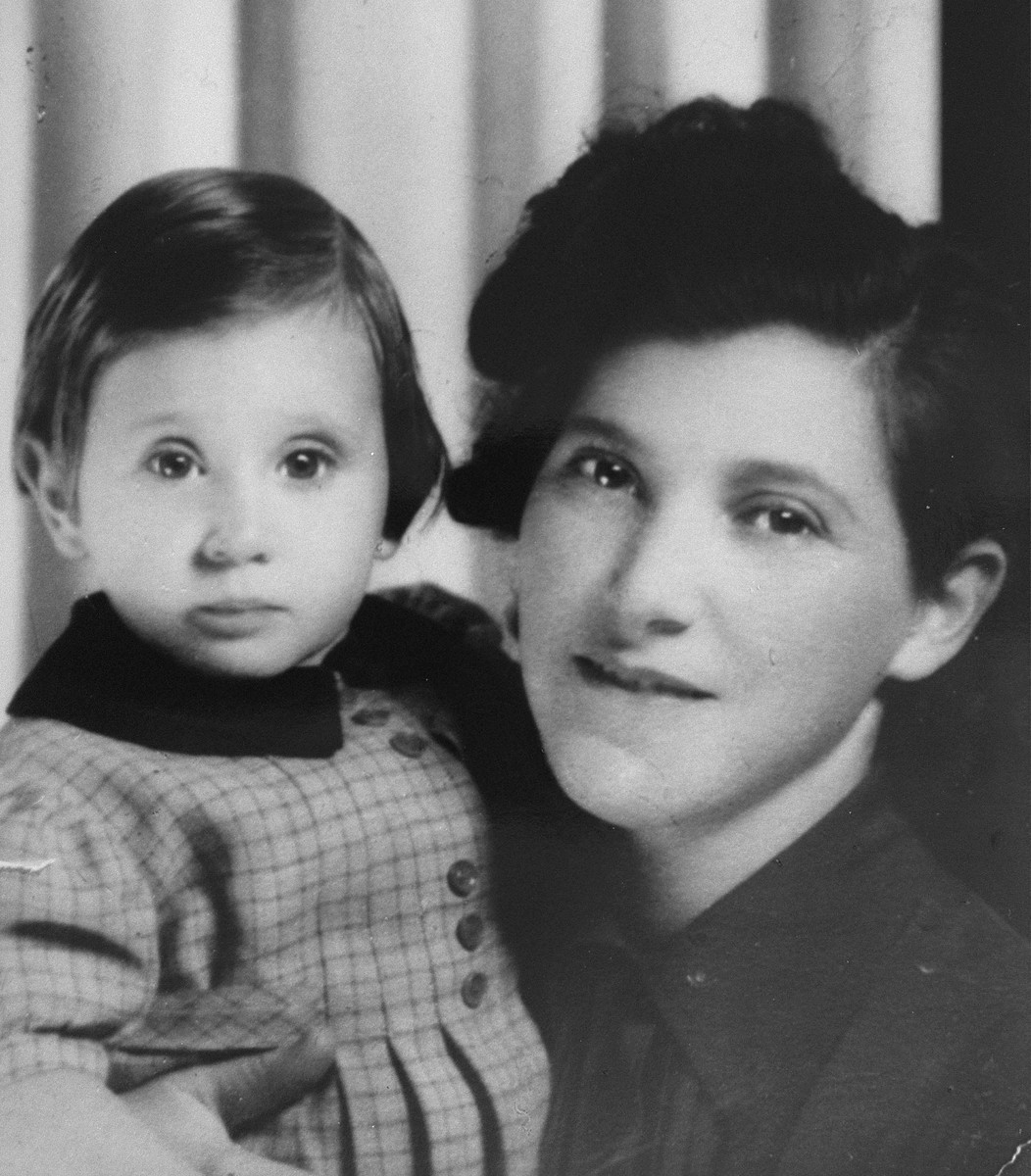 Portrait of a Jewish woman and her young daughter.

Pictured are Evi Weis with her mother, Magda Pollak Weisz, while en route out of Paris in 1941.
