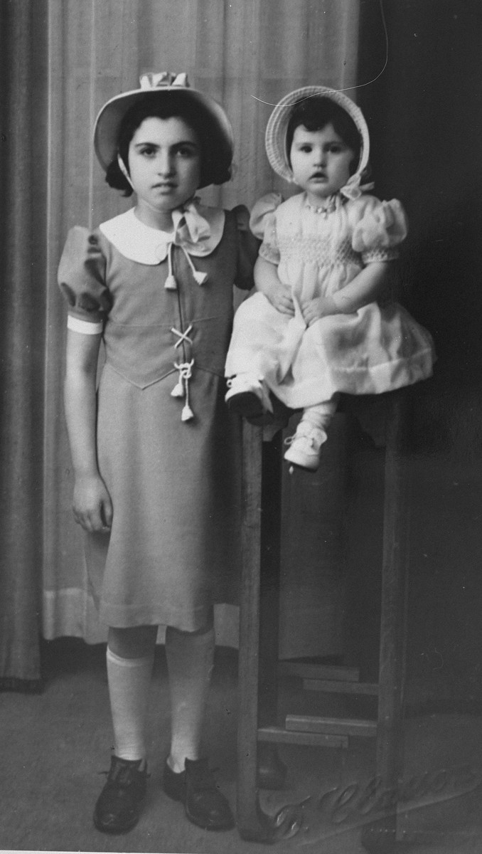 Portrait of Lea Tepicht and her younger sister, Georgette.

Lea and her sister were born in 1929 and 1938 respectively.  Both survived the war by hiding on the run, either by themselves or on farms.  Their father, Bernard Tepicht was deported to the Beaune-la-Rolande transit camp and was sent from there to Auschwitz, where he perished in 1942.  Their mother was also deported to Auschwitz via Drancy in June 1942, where she perished as well.
