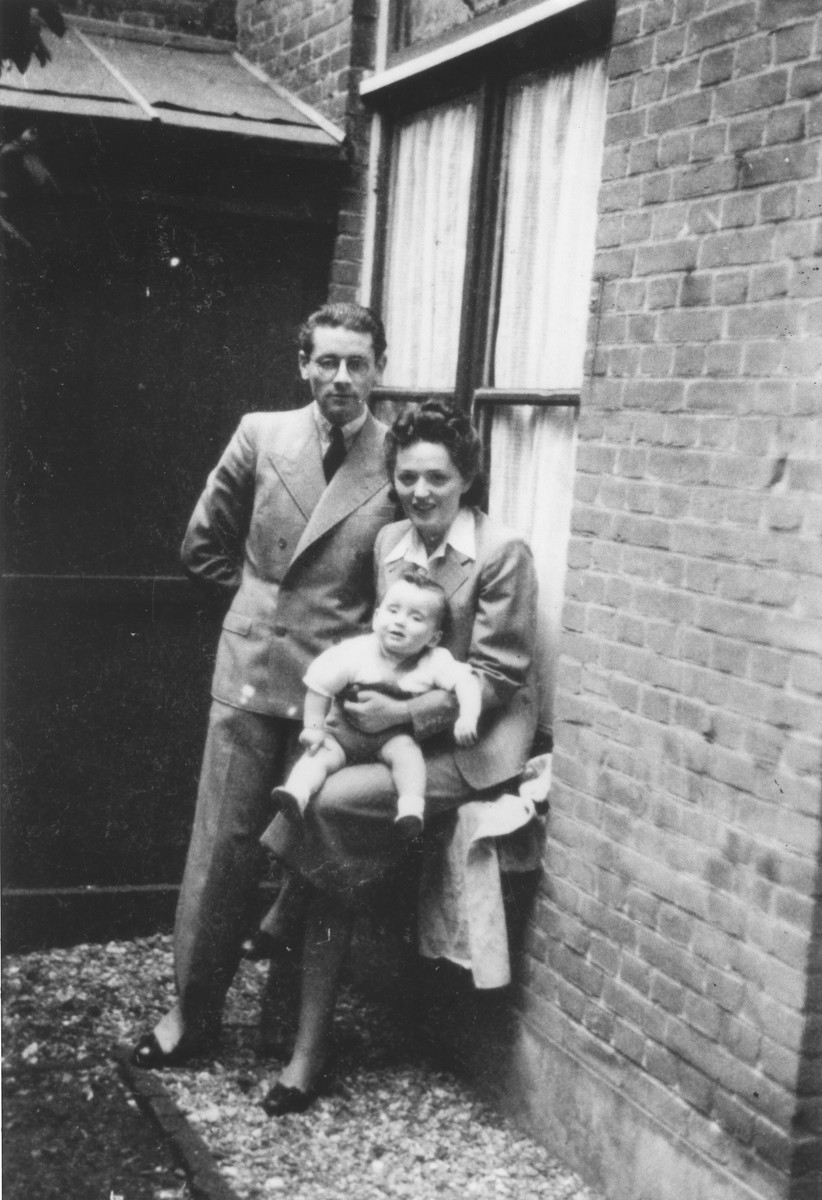 Leo and Emmy Krell pose with their son Robert outside their home in The Hague.