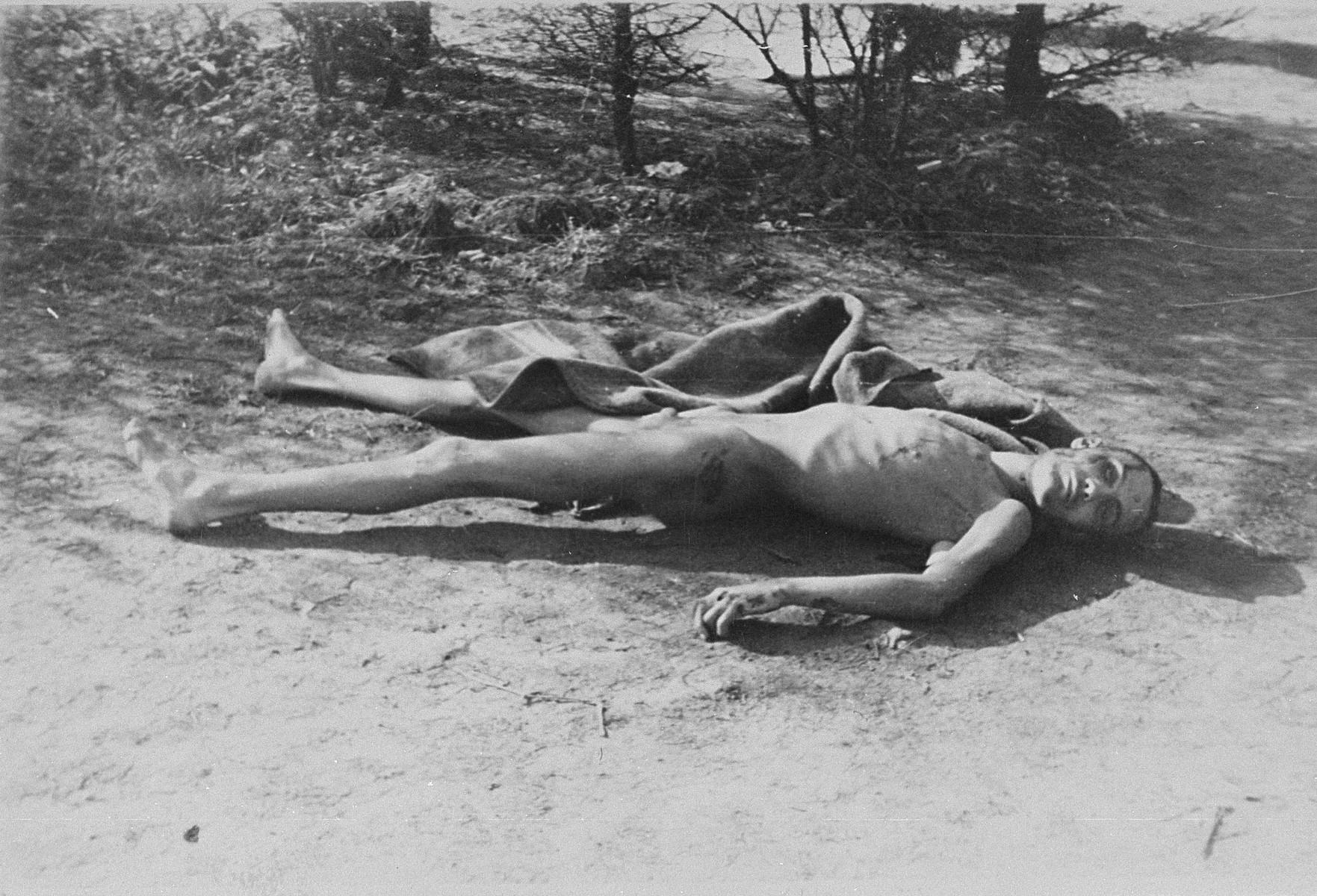 Corpse of a prisoner who died before the liberation of Ohrdruf by American troops.