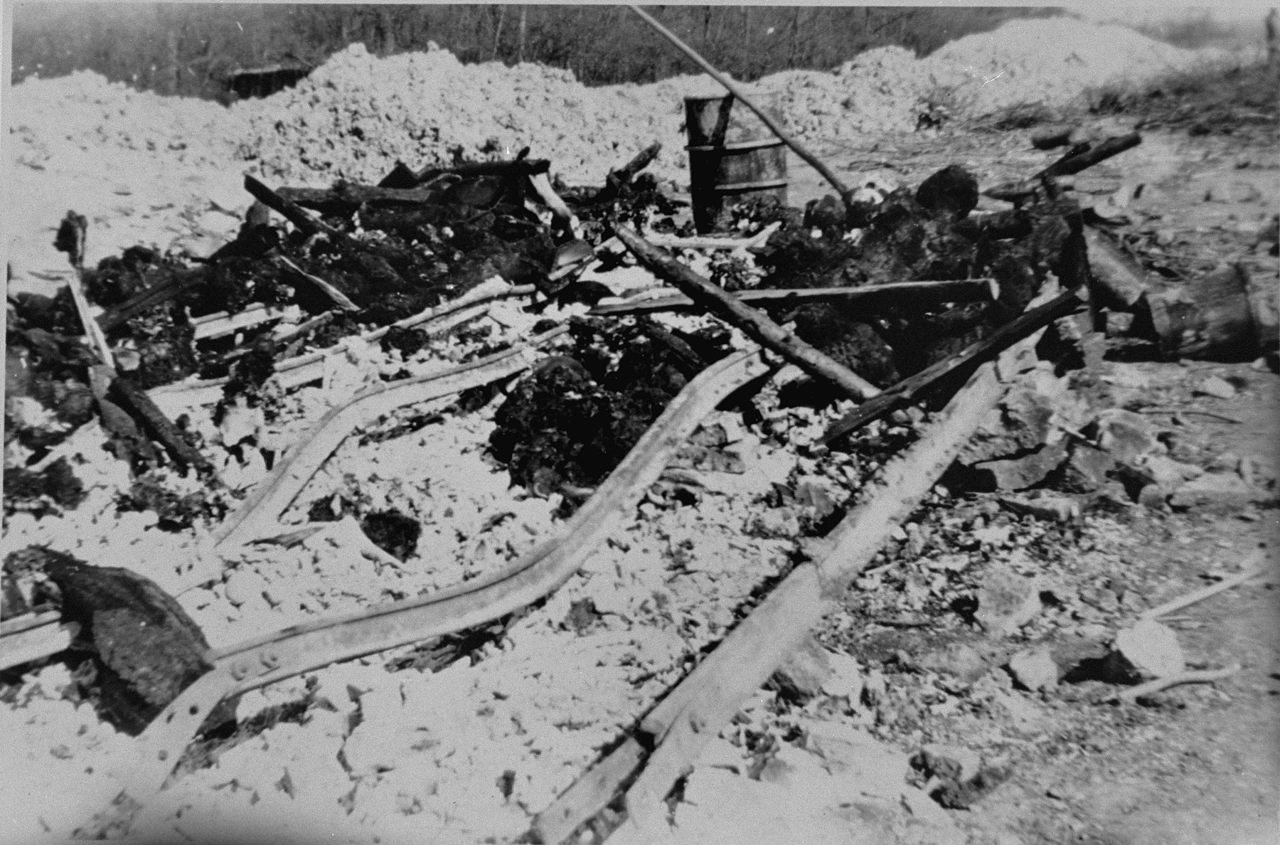 The charred remains of prisoners' corpses burned by the SS prior to the evacuation of the Ohrdruf concentration camp.