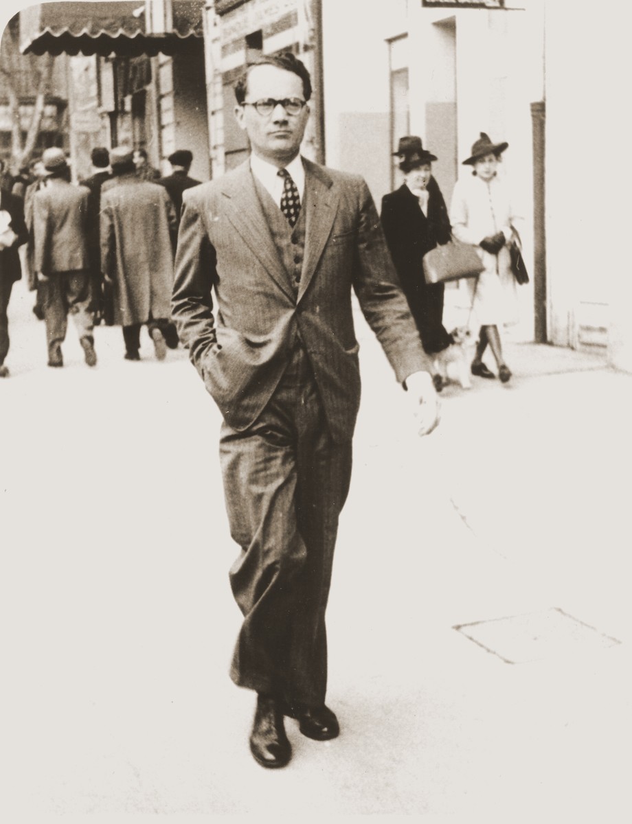 Varian Fry walking along the street in Marseilles.