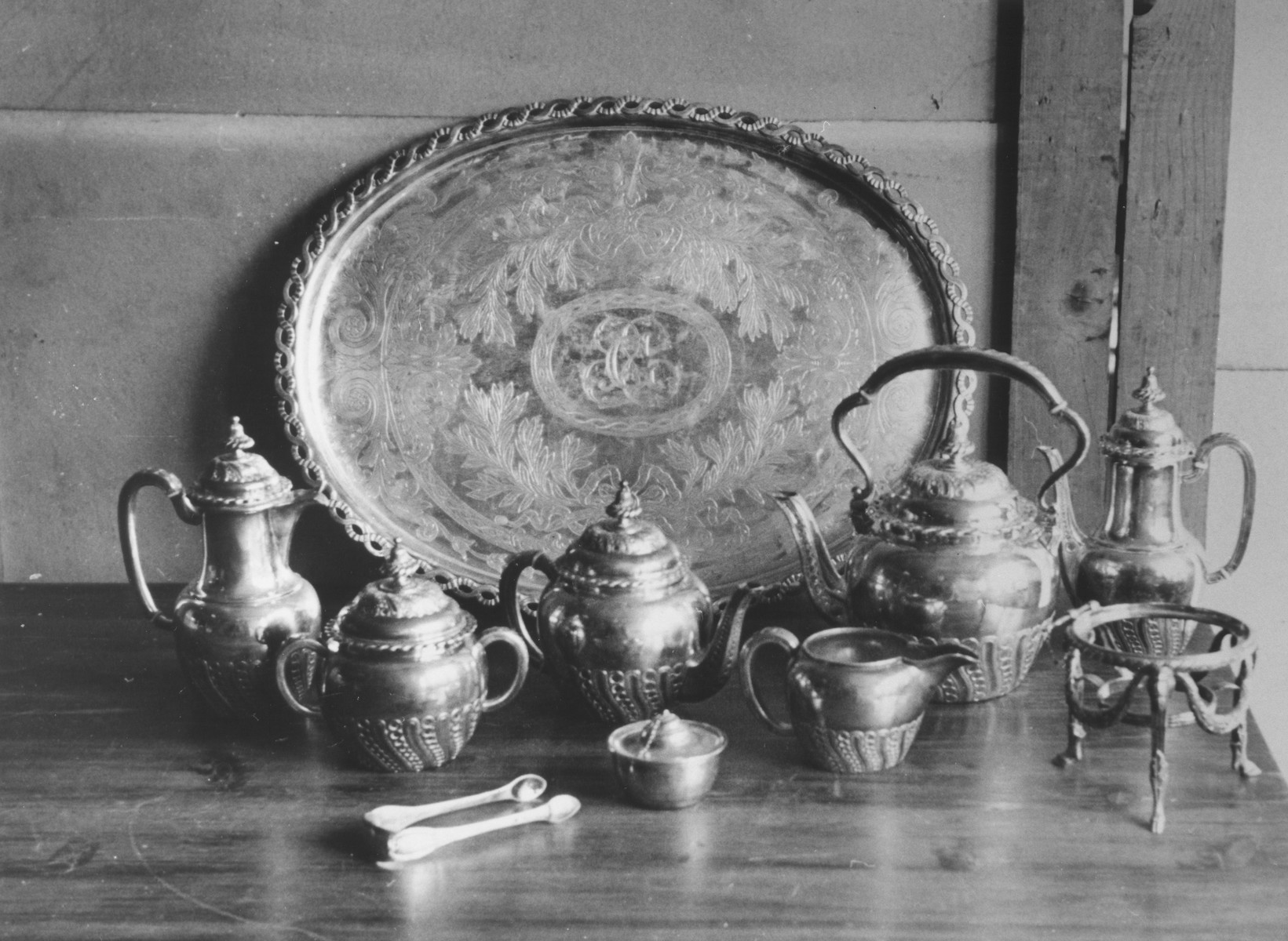 Display of a silver coffee set, confiscated from a Jewish household.