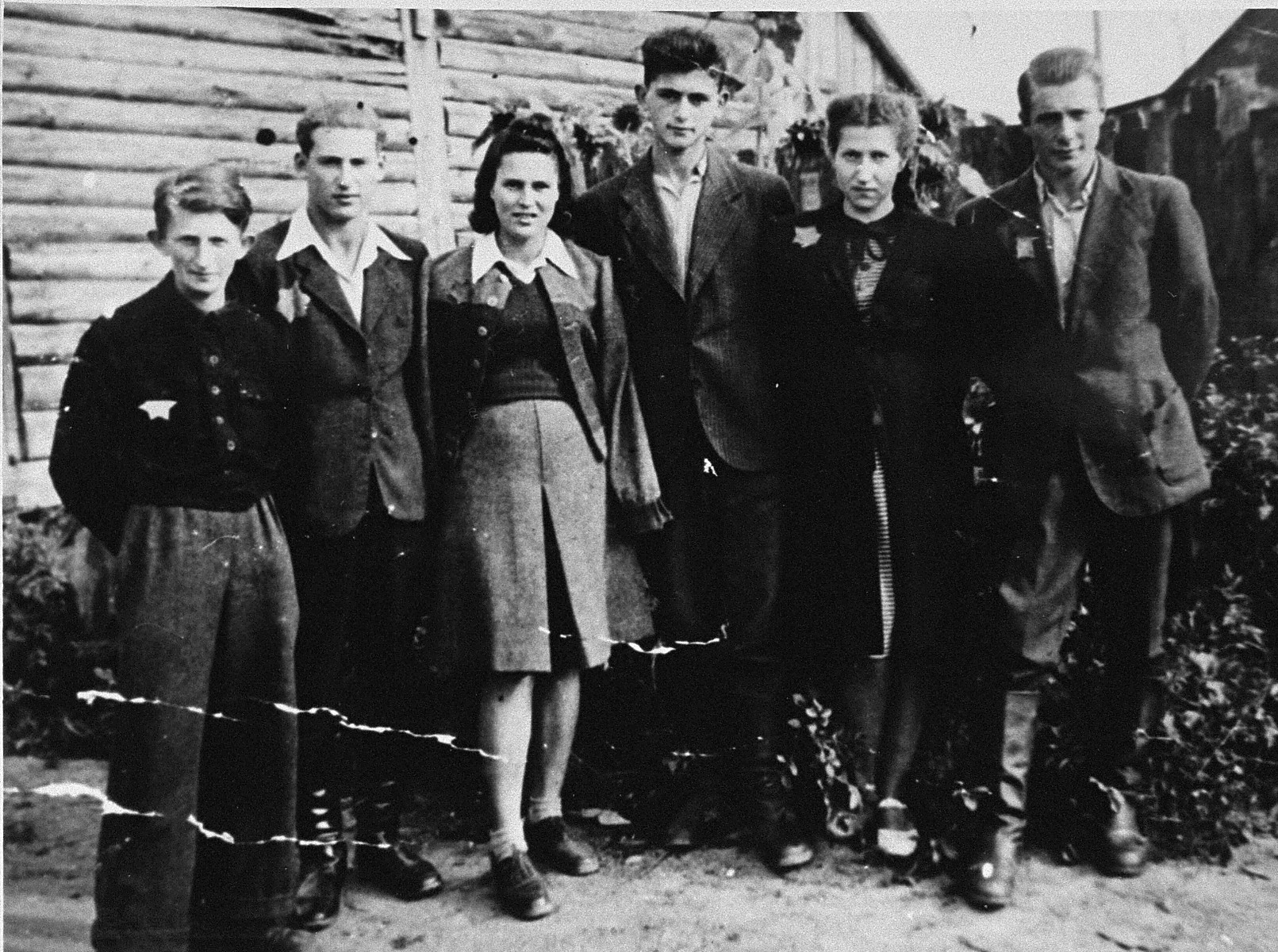 Group portrait of Jewish youth in the Kovno ghetto, who were involved in the underground.  

Pictured from left to right are:  Zalman Holtzberg, Samuel Ingel, Leah Port, David Goldin, Esther Labonowski and Israel Goldblatt.