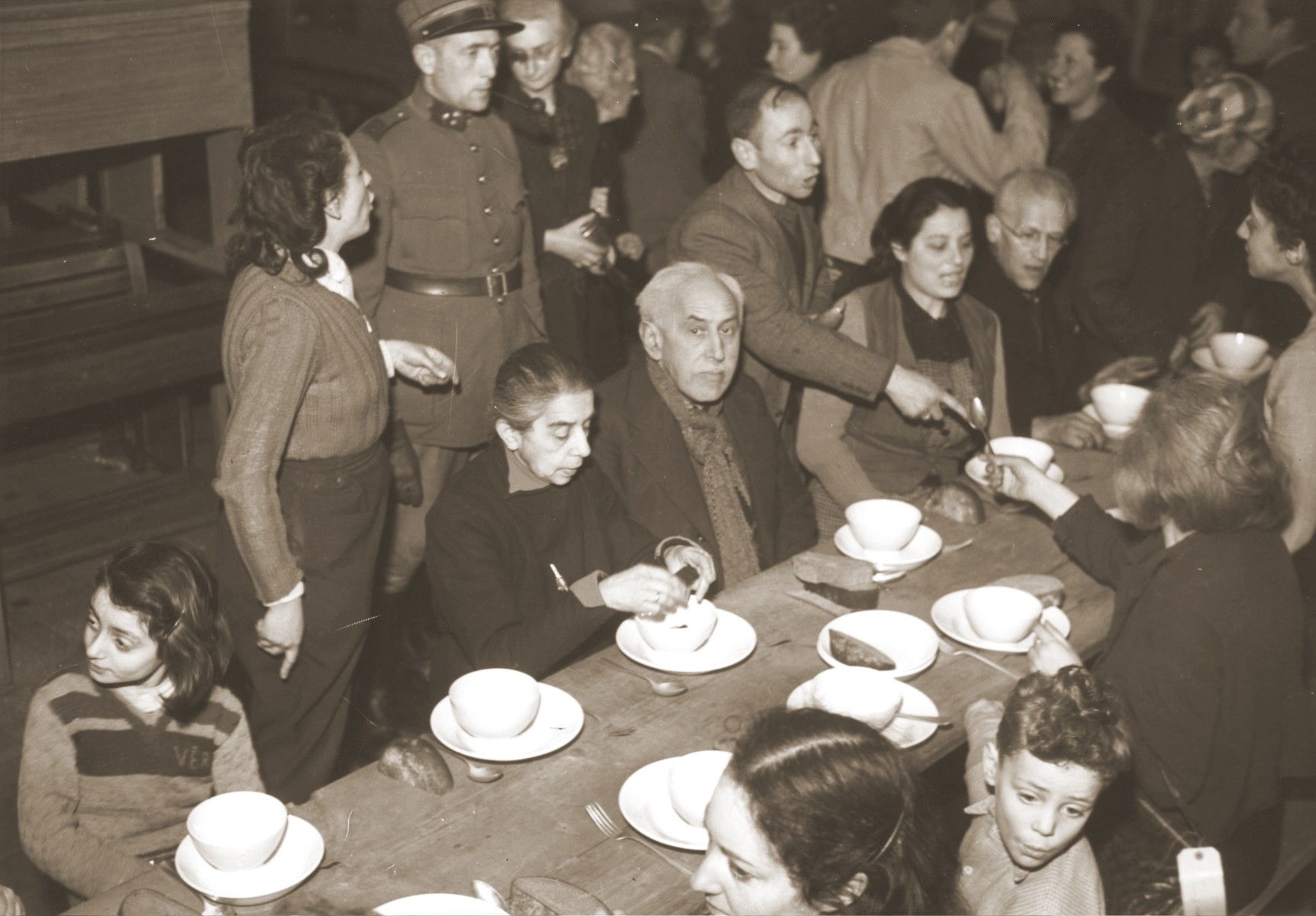 Jews rescued from Theresienstadt enjoy a warm meal in the Hadwigschulhaus in St. Gallen.