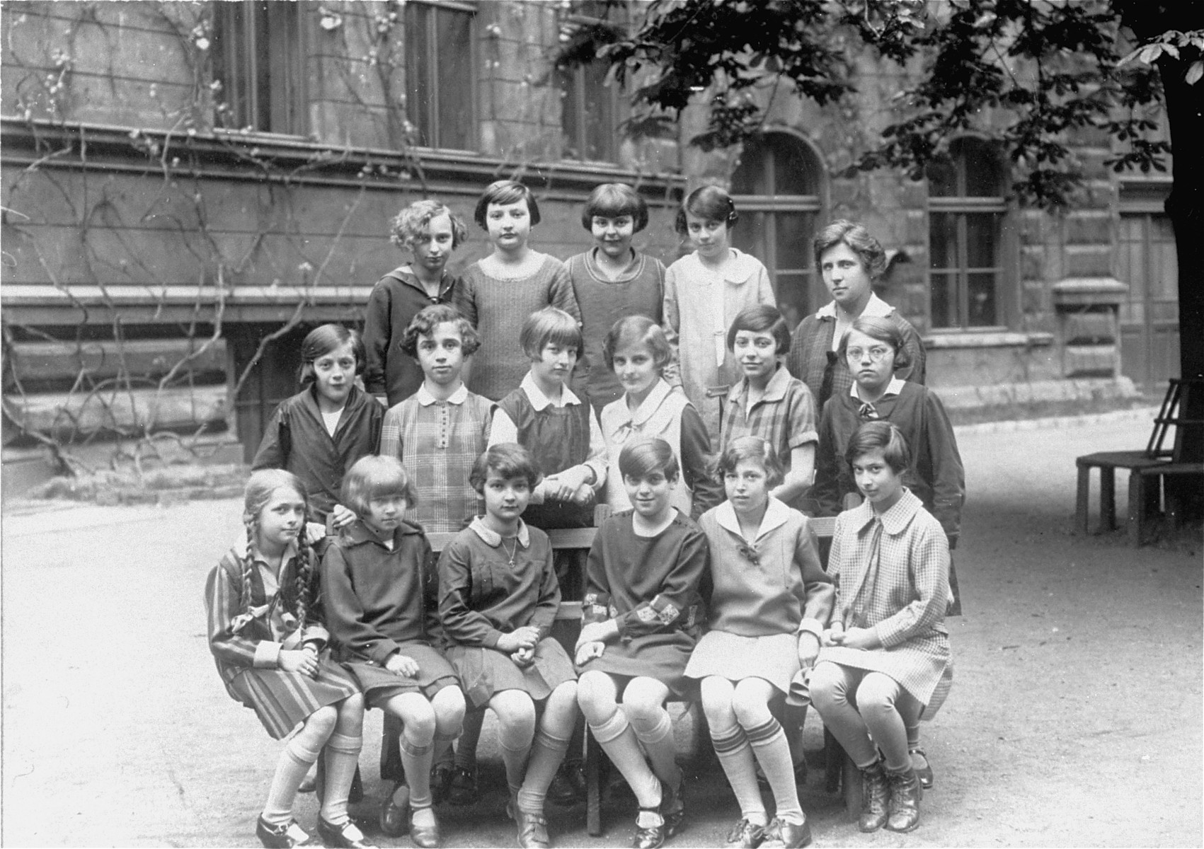 Group portrait of pupils at the Deutsches Maedchen Reform Real Gymnasium Lycee in Prague.

Among those pictured is Ruth Kohn (top row, second from the left).