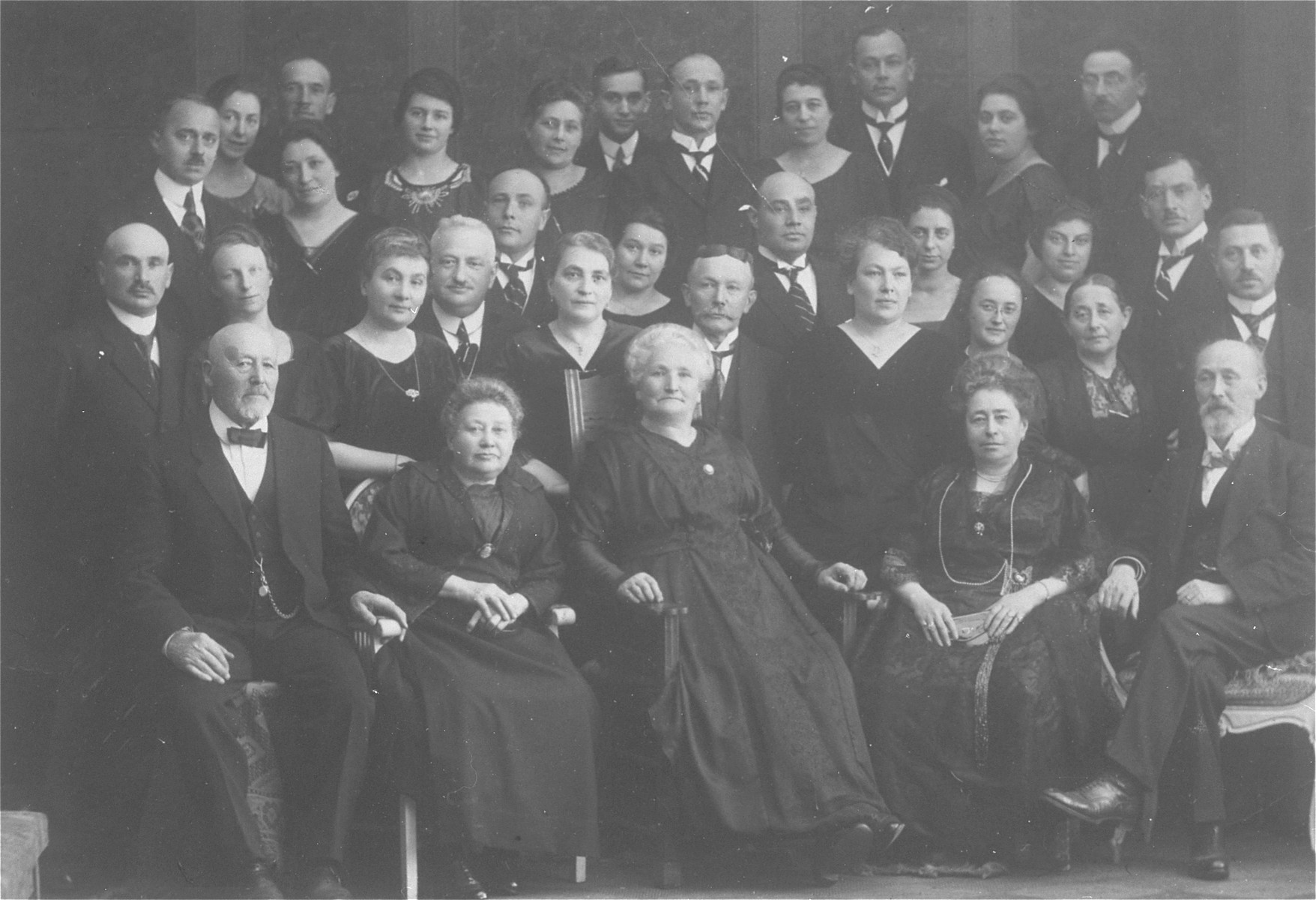 Group portrait of the extended Dahl family taken on the 75th birthday of Helene Dahl. 

Pictured on the bottom row (left to right): David Meyer, Sophie Meyer, Helene Dahl, unknown, Moses Meyer. Second row: Isadore Dahl, Sofia Dahl, Jenni Giesenow, George Giesenow,, unknown, unknown, Elyse Capell, unknown, Mrs Moses Meyer, Hugo Capell. Third row: Mr and Mrs Baer, Adolf Dahl, Olga Dahl, Karl Dahl, Marta Dahl, Tina Dahl, Robert Dahl. Top row: first two unknown, Emil Dahl, Klara Dahl, Augusta Franken, unknown, Max Stahl, Steffi Stahl, Otto Dahl, Else Jellinek, Felix Jellinek.