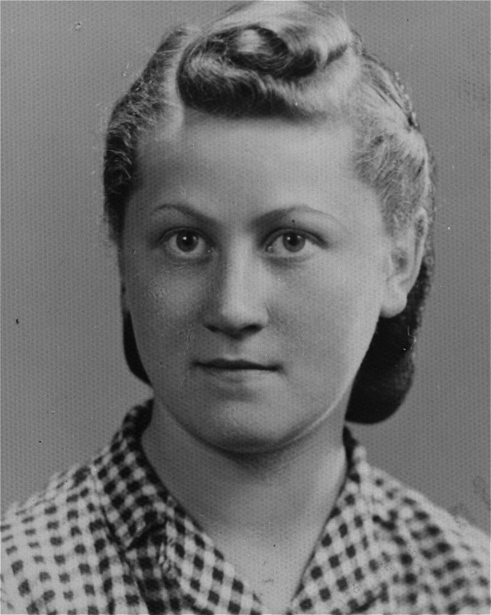 Portrait of Ester Fiks (Julcia), a member of the Hashomer Hatzair Zionist youth movement, who lived on false papers and served as a courier in the Jewish underground.  

The Polish inscription on the back of the photograph reads, "During our underground life/ From our times of misfortune/ To my dearest friend/ Jula 1944".

Julcia met Lodzia Hamersztajn in 1943 while they were both living on false papers in Krakow and working for the Germans.  They stayed together until the liberation.  Julcia had a younger brother, Benzion, known as Bolus, who survived the war on the Aryan side of Warsaw as one of the cigarette sellers in Three Crosses Square.  Julcia and her brother immigrated to Palestine in 1946.