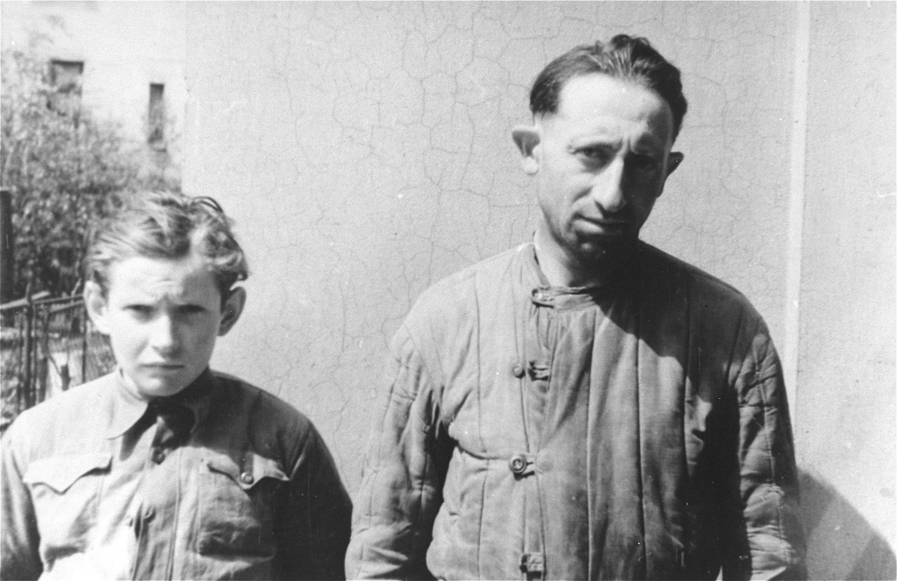 Lyba Leibowicz (right) poses with Jozek Hodor (left) in Rzeszow.

Lyba Leibowicz was a Jewish trapper who was a member of the partisan group that Naftali Saleschütz joined in the forests near Kolbuszowa.  Jozek Hodor was the son of Jan Hodor, a Polish peasant who provided food for the Jewish partisans.