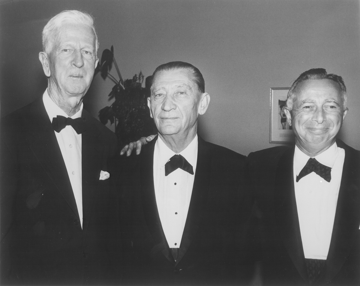 American Jewish philanthropist Abraham S. Kay (center) poses with James G. McDonald (left) and Samuel Sugar (right) at an affair in Washington, D.C.