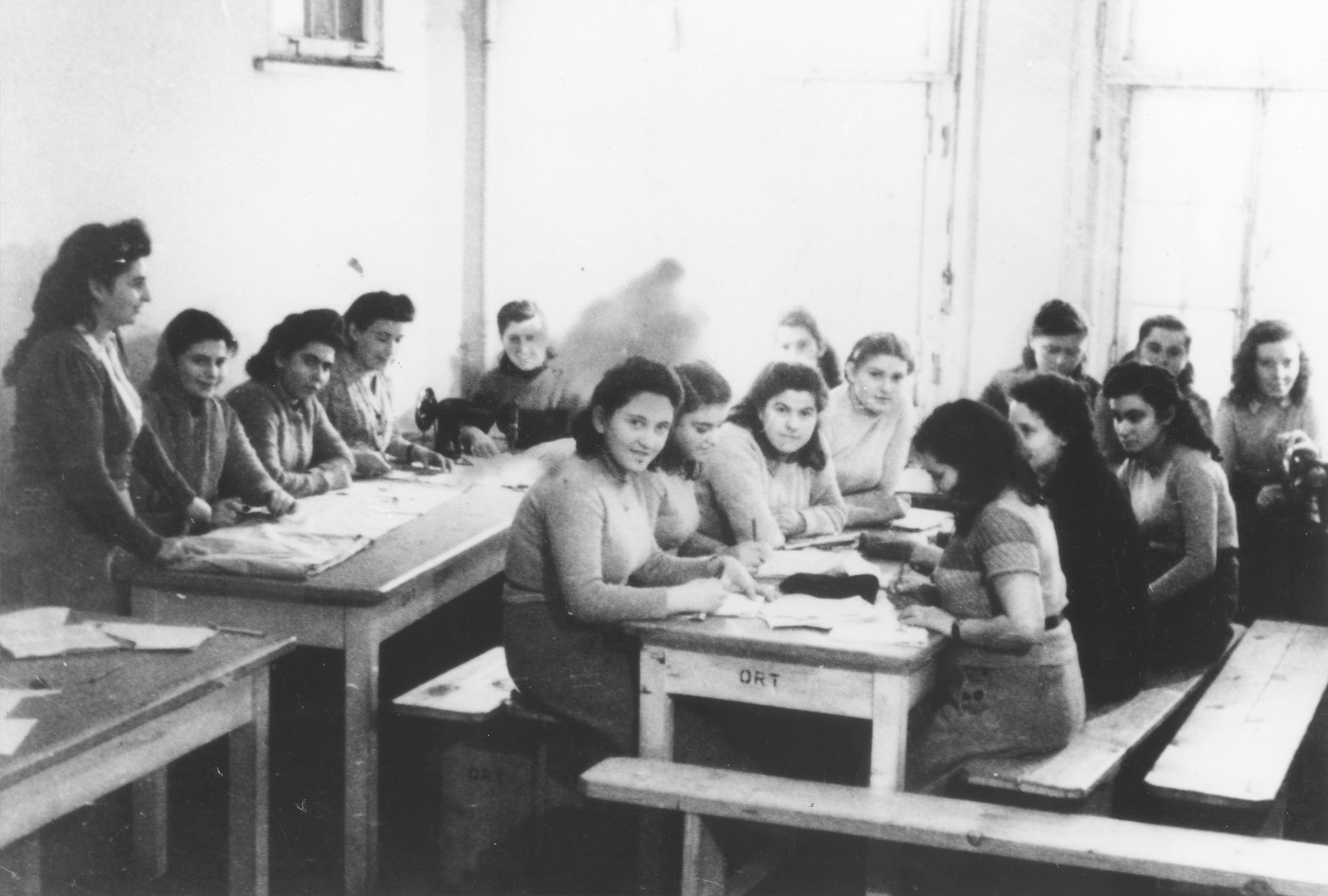Young women attend a sewing class at the ORT school in the Schauenstein displaced persons camp for children.