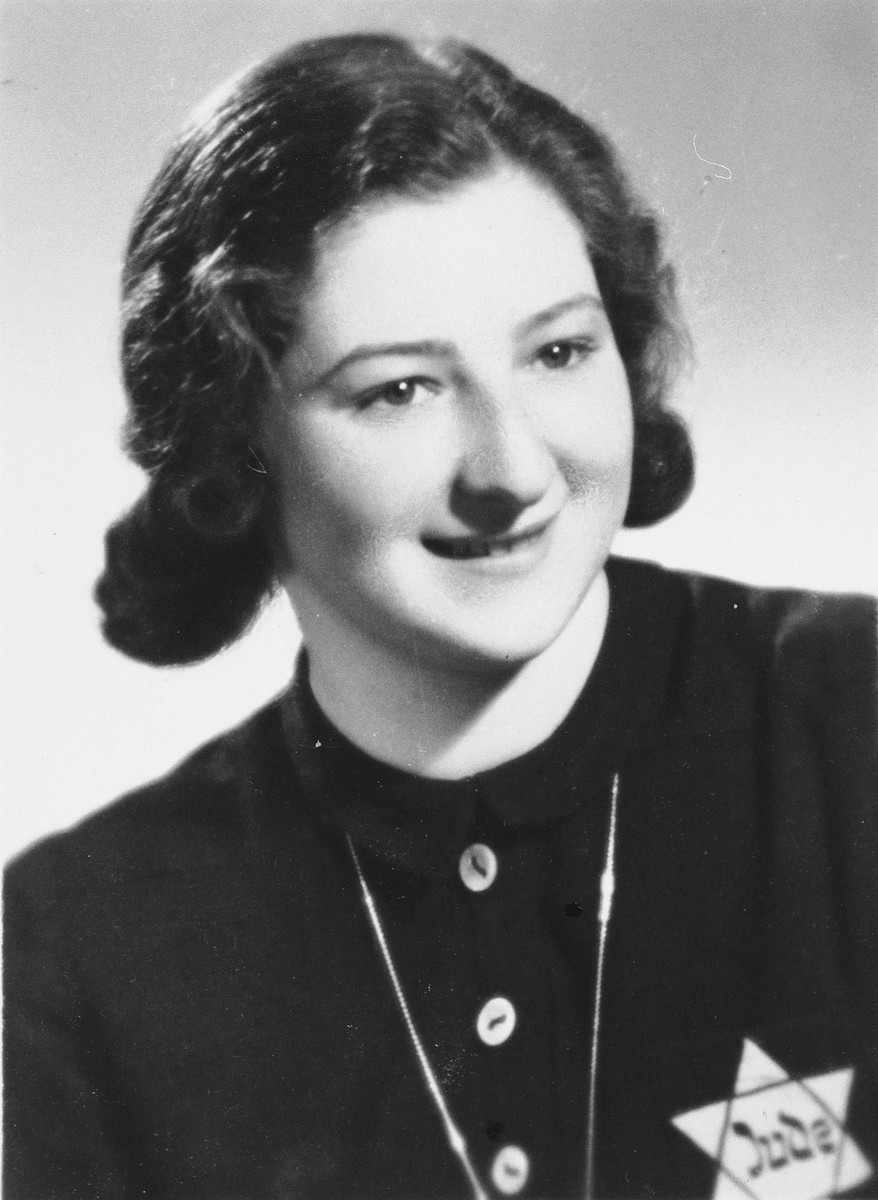 Portrait of a young Jewish woman wearing the yellow star in Prague during World War II.

Pictured is Hana Fuchs.
