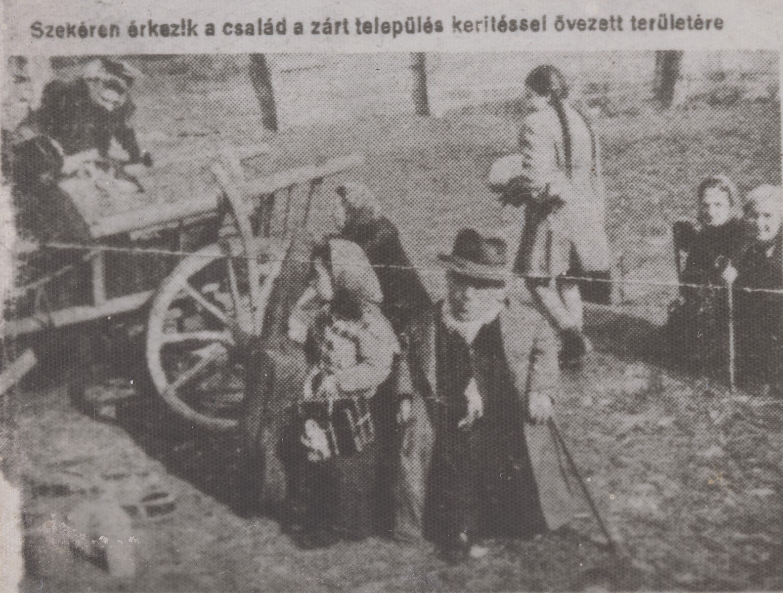 Members of the Ovici family arrive by farm wagon to the ghetto of Dragomiresti prior to their deportation to Auschwitz.

The original newspaper caption reads: "The family arrives to the closed residential area which is surrounded by a fence.  They arrived on this horse-drawn wagon."