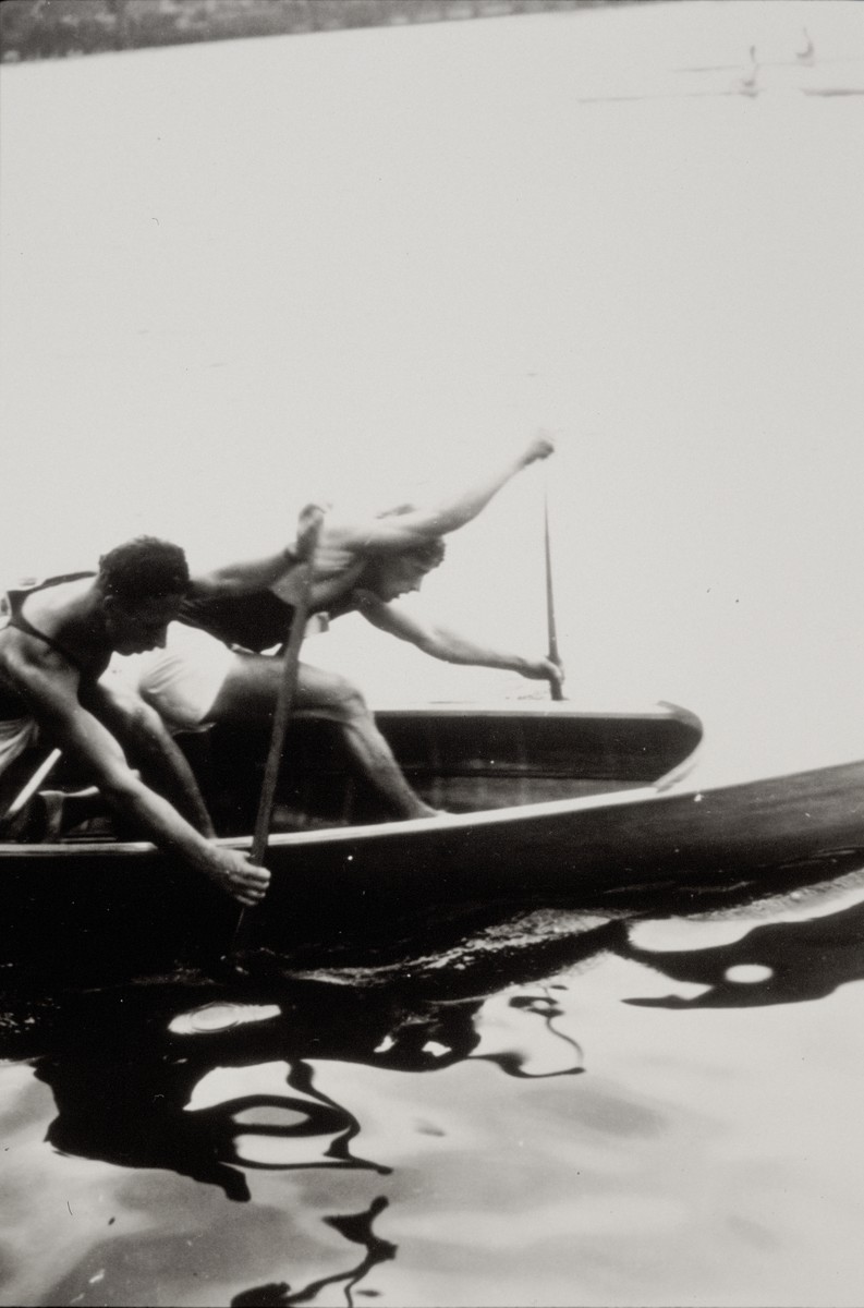 Athletes compete in a canoe race at the 11th Summer Olympic Games in Berlin.