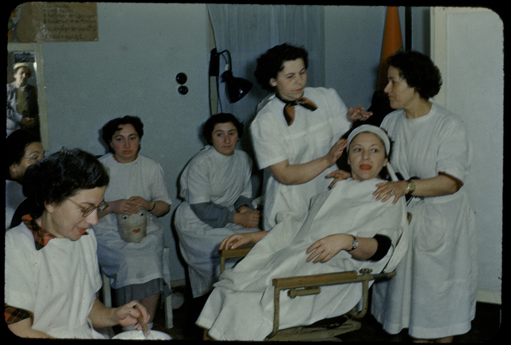 Women learn to become beauticians at an ORT school in the Foehrenwald displaced persons camp.