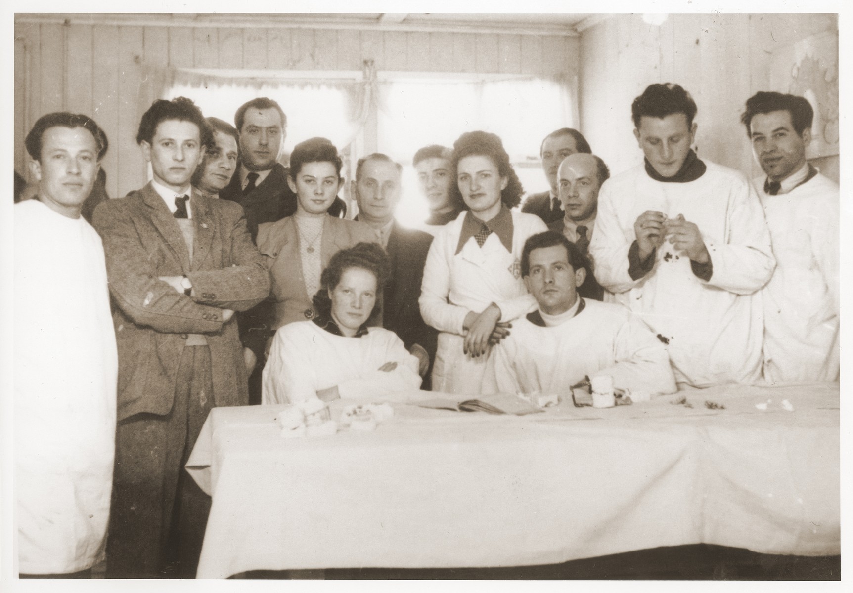 Group portrait of students and instructors in the dentistry course at the ORT vocational school in the Feldafing displaced persons camp.

Pictured second from the left is Laco (Louis) Fisher.