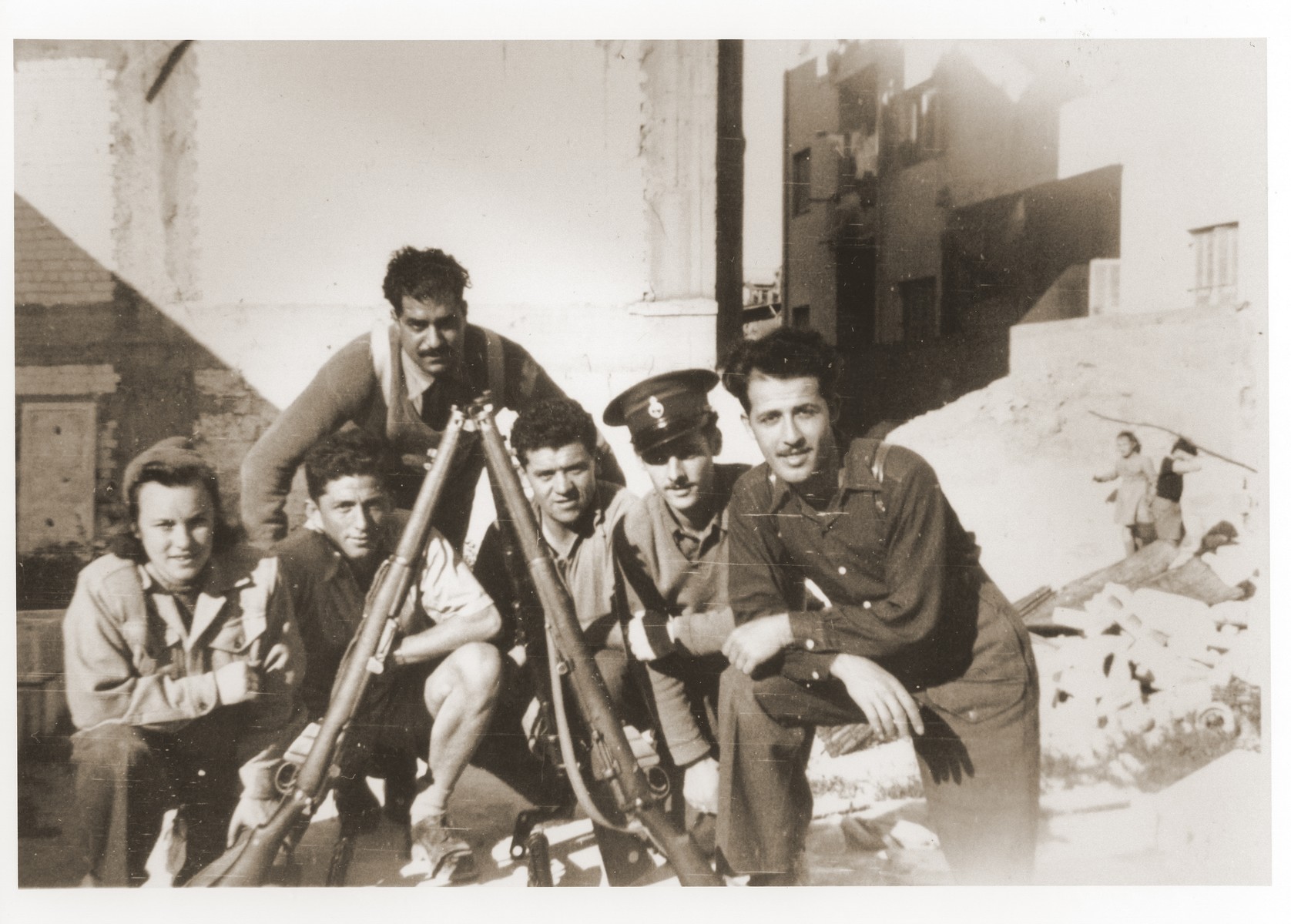 Members of a Haganah unit pose with their rifles.

Among those pictured is Saba Fiszman.