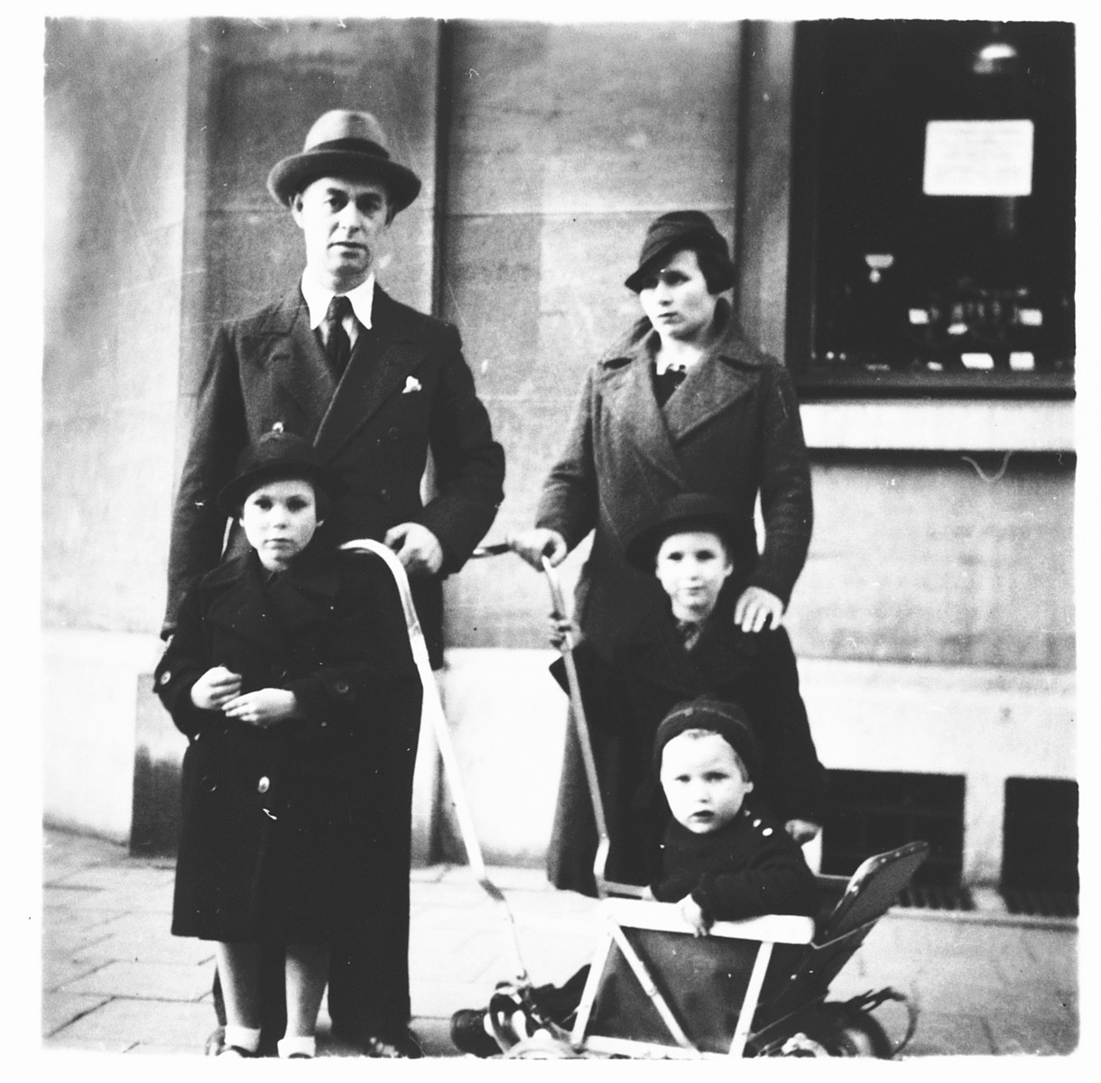 The Altenberg family poses outside a store in Antwerp.