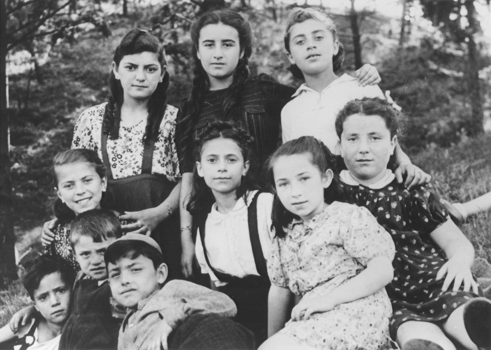 School children from the Tempelhof DP camp go for an outing.

Chuma Rendler is pictured on the far left, middle row.