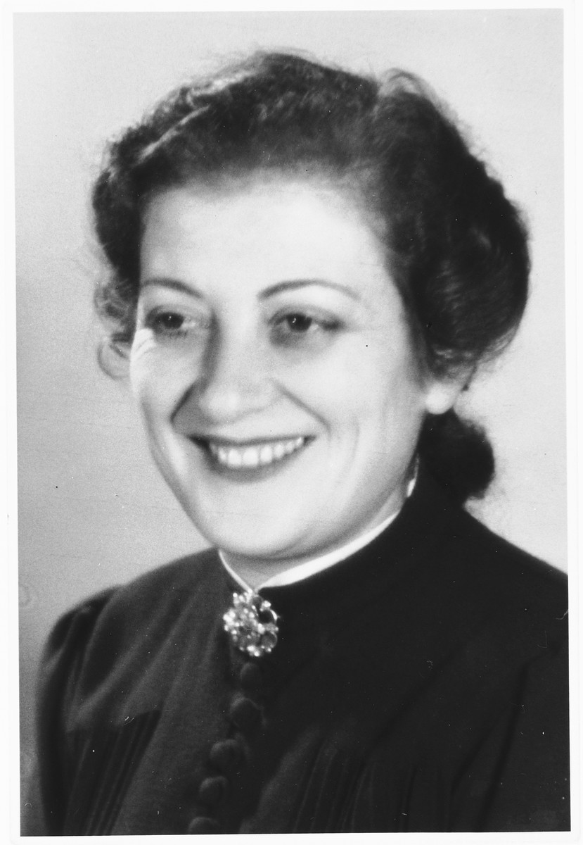 Studio portrait of a Jewish woman living in Brussels during the German occupation taken shortly before she went into hiding.

Pictured is Lea Abramowicz.