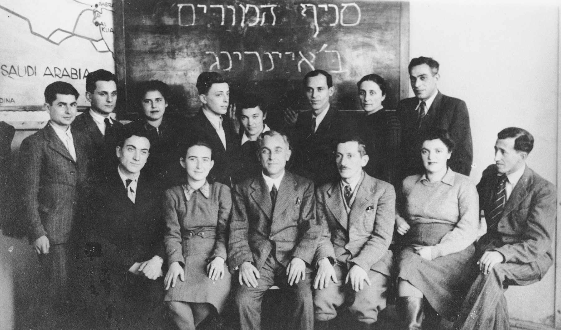 Group portrait of teachers in the Ainring displaced persons camp.