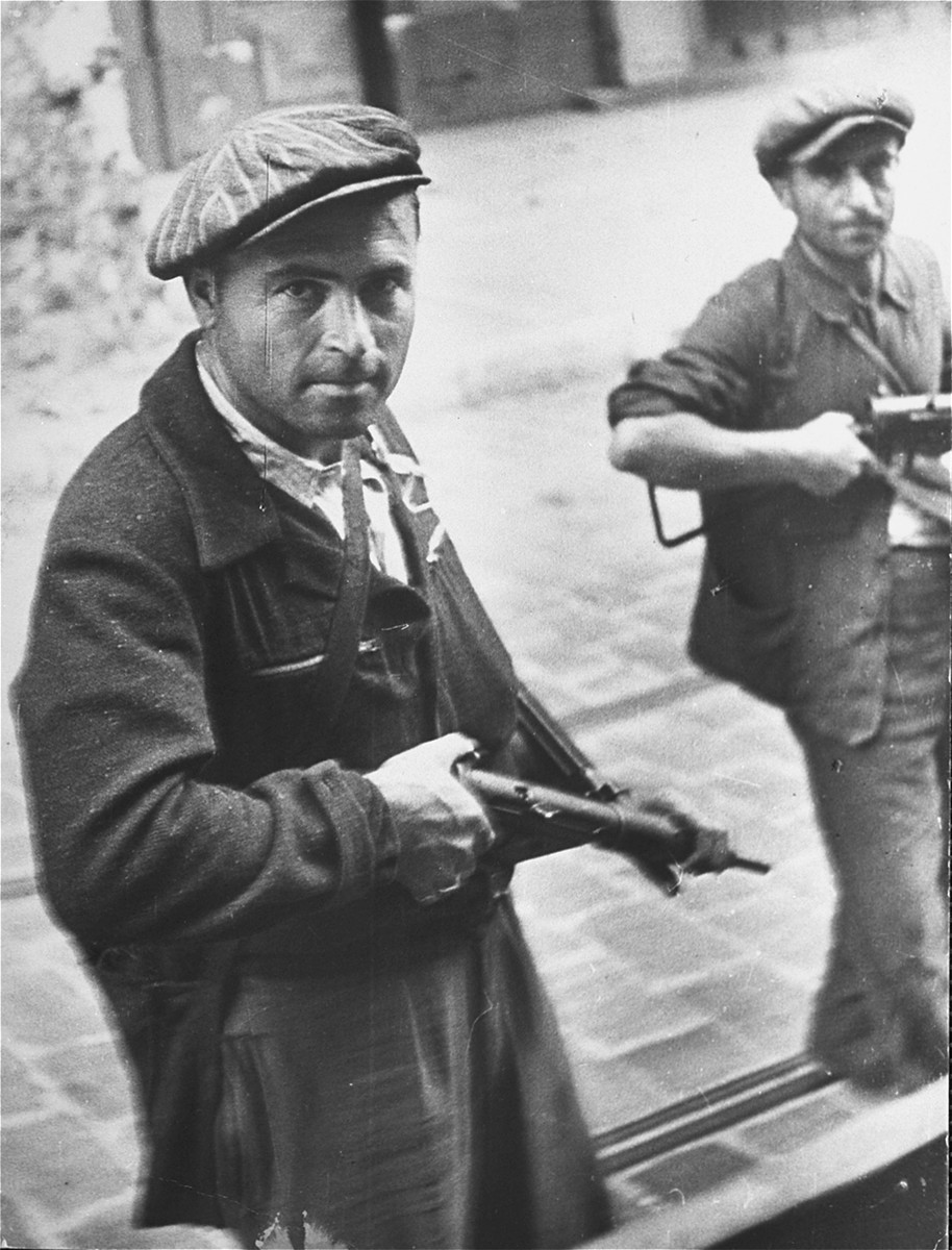 Bedukian Sarkis, a French partisan of Armenian extraction, patrols a street during the August 1944 insurrection in the south of France.

Bedukian Sarkis belonged to the Marat company of the FTP-MOI.  He was killed by an enemy convoy approximately one hour after this photograph was taken.
  
[Source: "Courrier des lecteurs," La Lettre des resistants et deportes juifs, 34 (June -July 1997)].