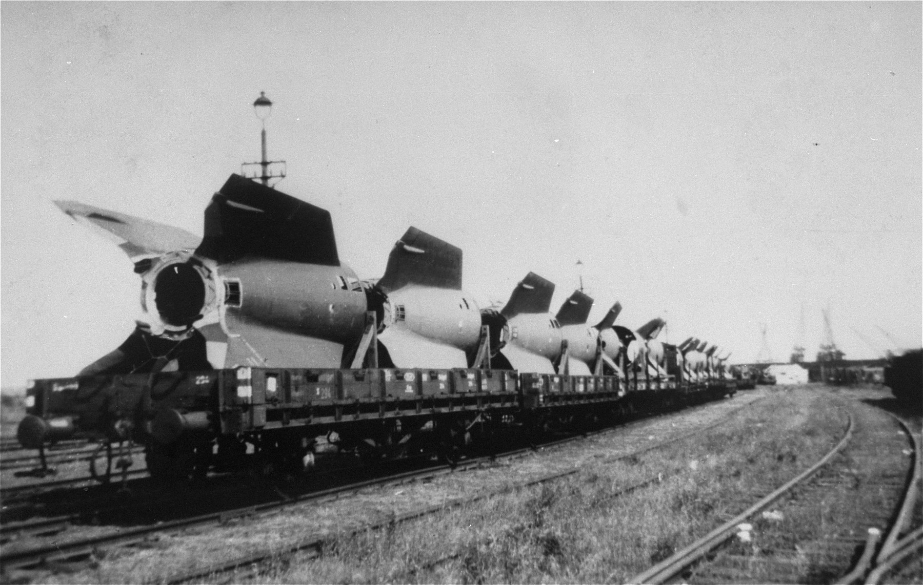 V-2 rocket tail fins manufactured at Dora-Mittelbau, are sent by rail to Antwerp, where they will be trans-shipped to the United States.