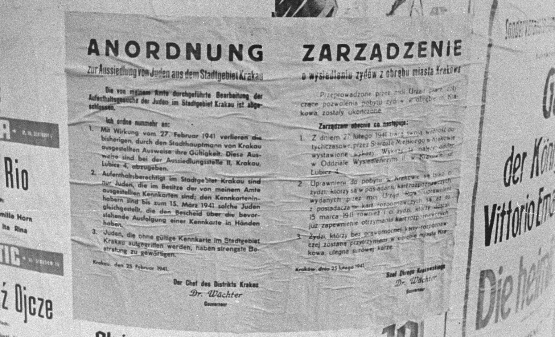 Close-up of an announcement affixed to a city kiosk, ordering the resettlement of Jews from the city of Krakow, signed by district chief, Dr. Wachter.