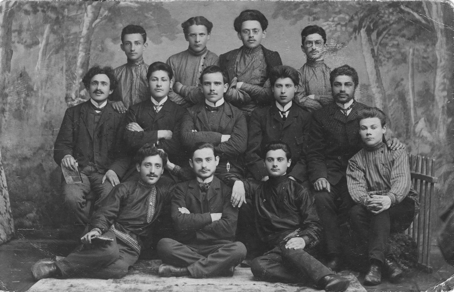 Studio portrait of a group young Jewish men taken in the early 1900s.

Benzion Bloch is seated in the middle of the front row.