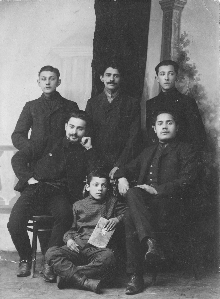 Studio portrait of a group young Jewish men taken in the early 1900s.

Benzion Bloch is at the left.