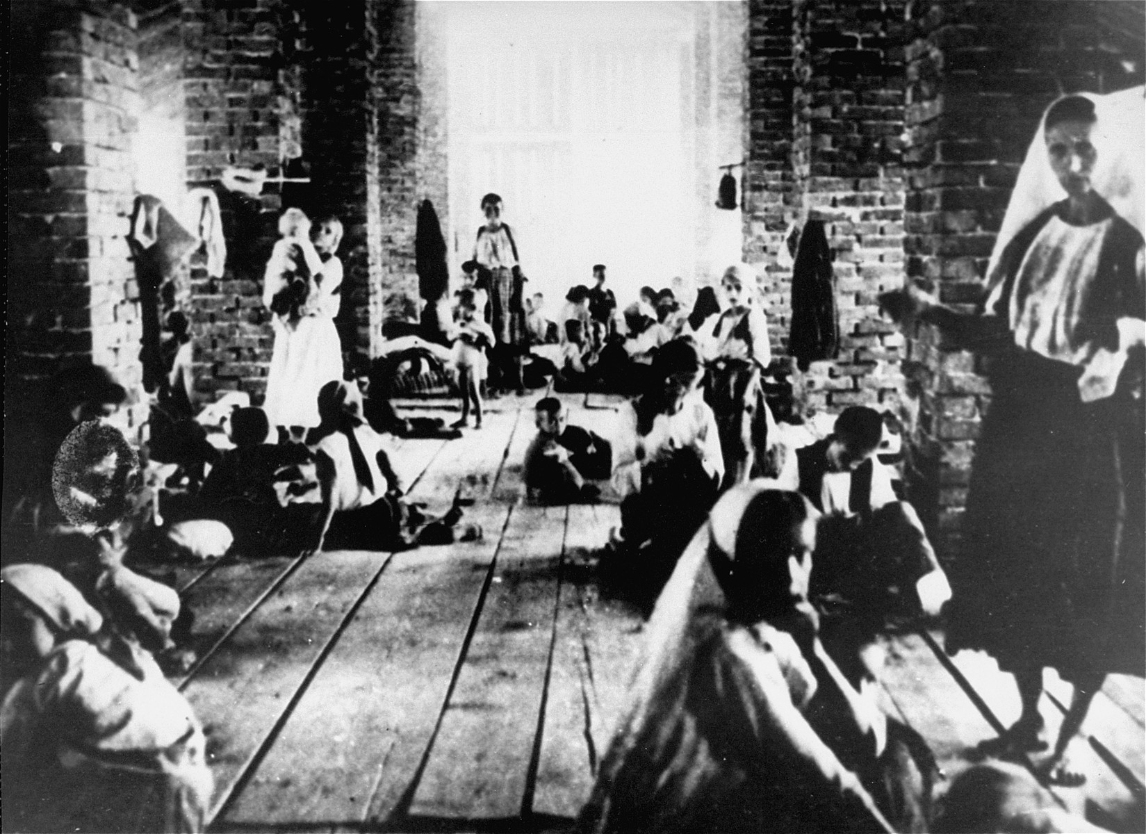 Mothers and children imprisoned in the "Kula" (tower) of the Stara Gradiska concentration camp.
