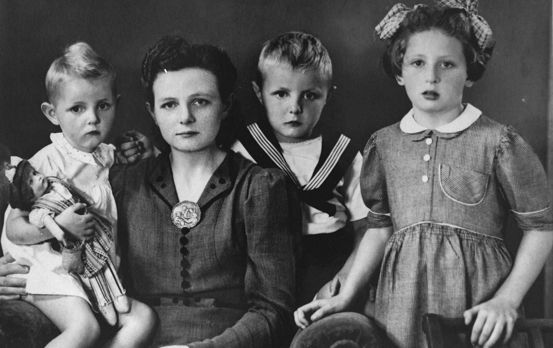 A Jewish child in hiding poses with members of the Dutch family that adopted her.  Pictured is the donor, Henny Kalkstein (right) with Dieuwke Hofstede and her two sons, Maaike and Andries. 

Philip and Dieuwke Hofstede were each honored by Yad Vashem as one of the Righteous Among the Nations.