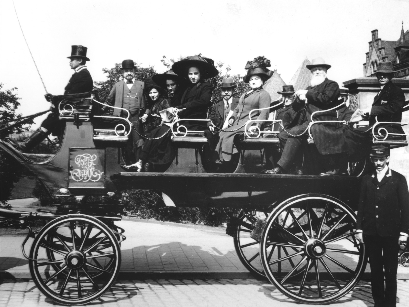 The Gottschalk family riding in a horse-drawn carriage.  

Pictured behind the coachman are Hugo, Bertha, Gertrud and Kaethe Gottschalk.