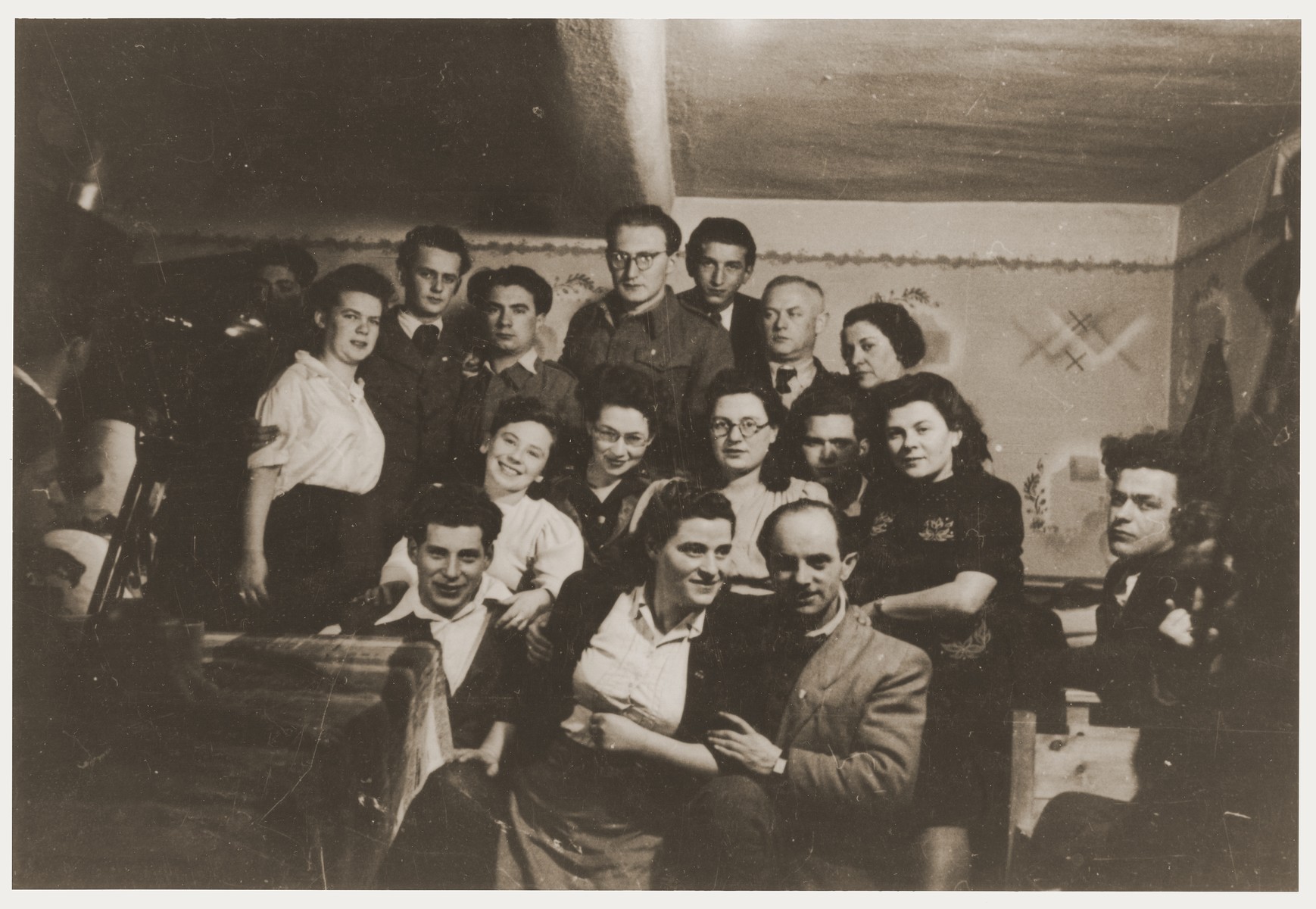 Group portrait of members of Kibbutz Nili hachshara (Zionist collective) in Pleikershof, Germany.  

Among those pictured are Noach and Sara (Feldberg) Miedzinski (front row, center) and Baruch Chita (front row, left).