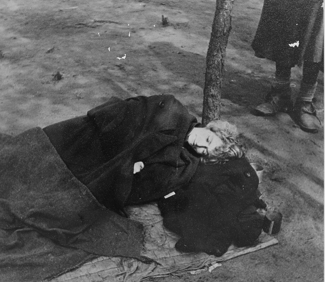 A survivor suffers from typhus following liberation in the Bergen-Belsen concentration camp.

Pictured is Eva Roden (nee Vonchovskova).