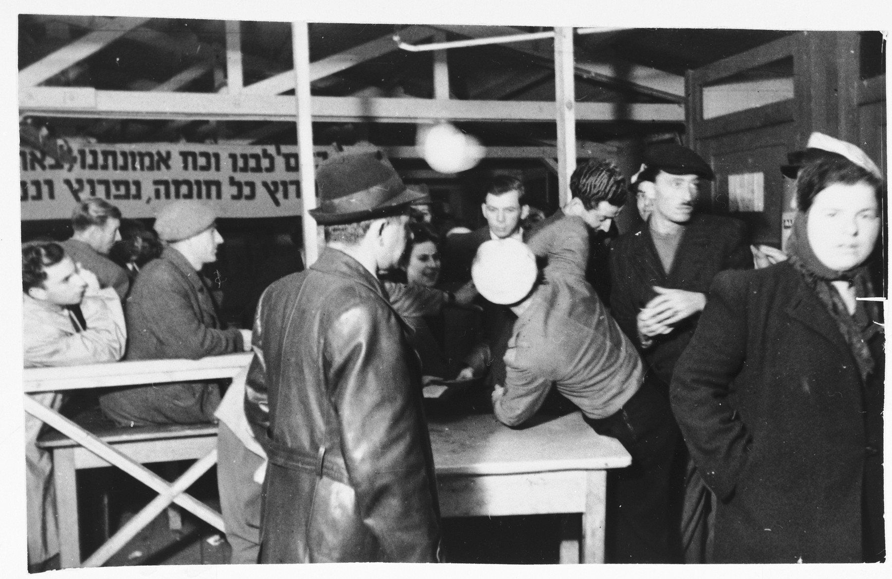 A Jewish policeman supervises elections in the Zeilsheim displaced persons' camp.