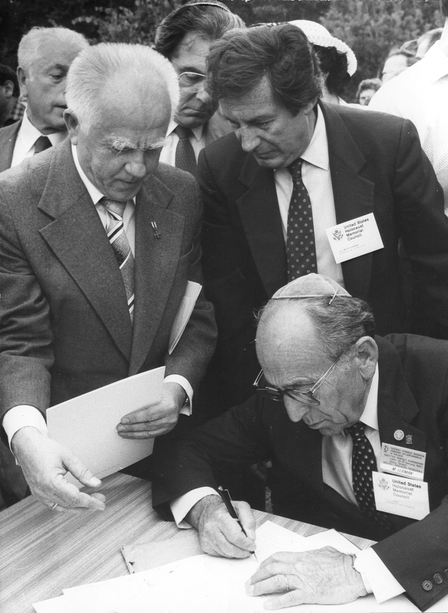Miles Lerman, representing the U.S, Holocaust Memorial Council, signs an agreement with the Main Commission for the Investigation of Nazi Crimes in Poland at the site of Belzec.