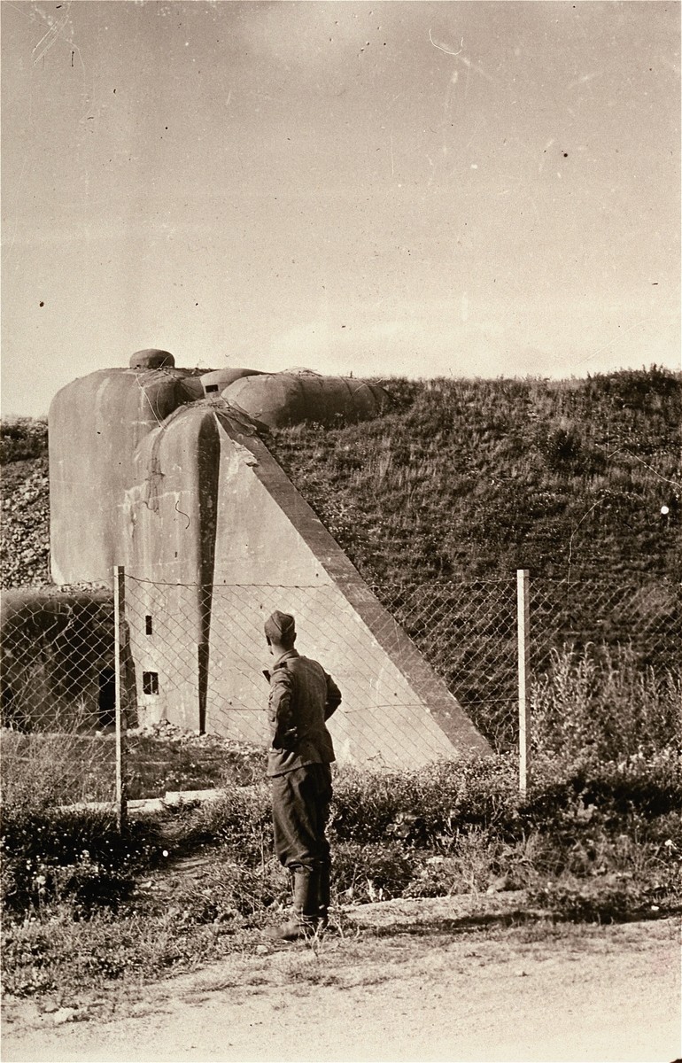 A German soldier examines fortifications on the Maginot Line, after the defeat of France by the German army.