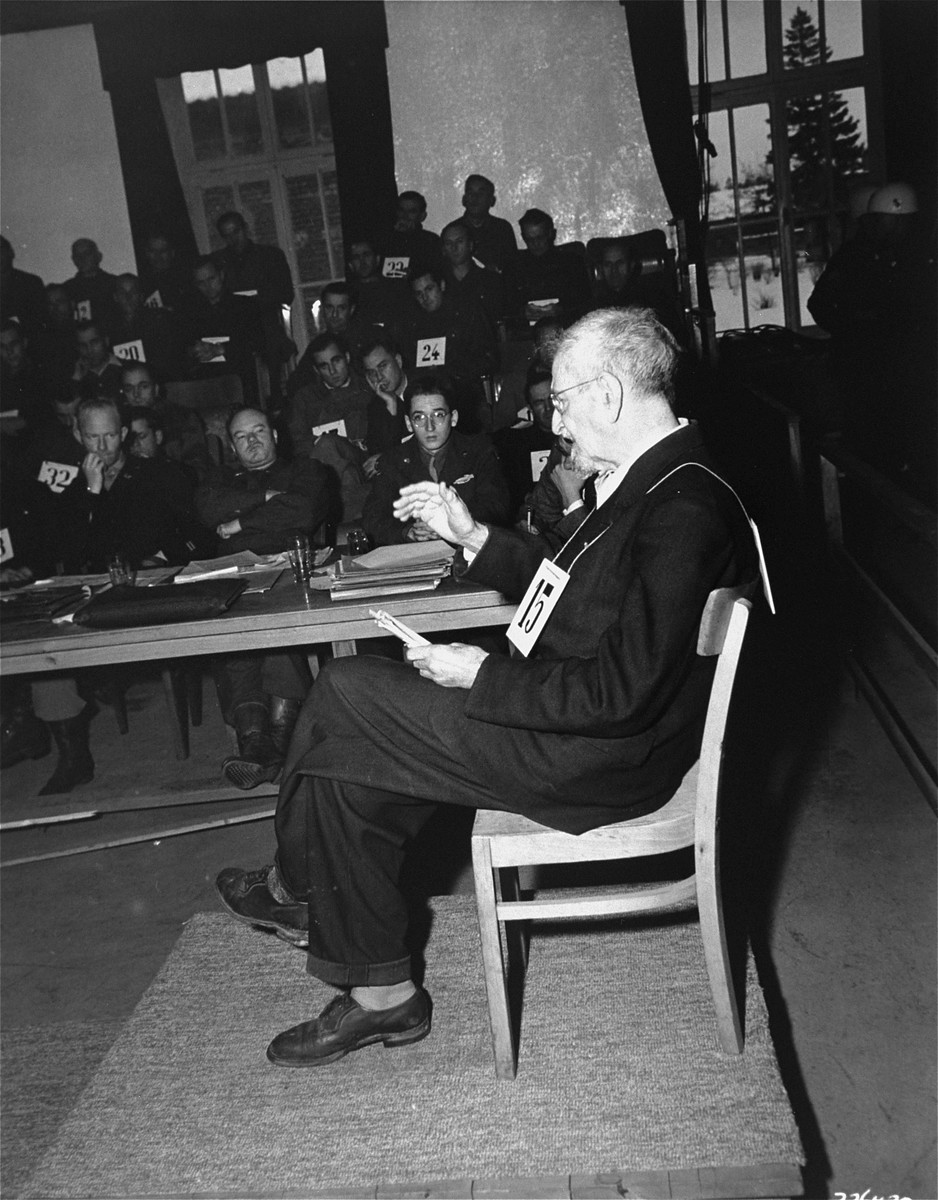 Dr. Klaus Karl Schilling testifies at the trial of former camp personnel and prisoners from Dachau.

Dr. Klaus Karl Schilling was a physician who infected over one thousand prisoners with malaria in his experiments at the Dachau camp.  In his appeal in English after cross examination, Schilling explained,  "I have worked out this great labor.  It would be really a terrible loss if I could not finish this work.  I don't ask you as a court, I ask you personally to do what you can; to do what you can to help me that I may finish this report.  I need only a table and a chair and a typewriter.  It would be an enormous help for science, for my colleagues, and a good part to rehabilitate myself."  His voice then broke and he cried.