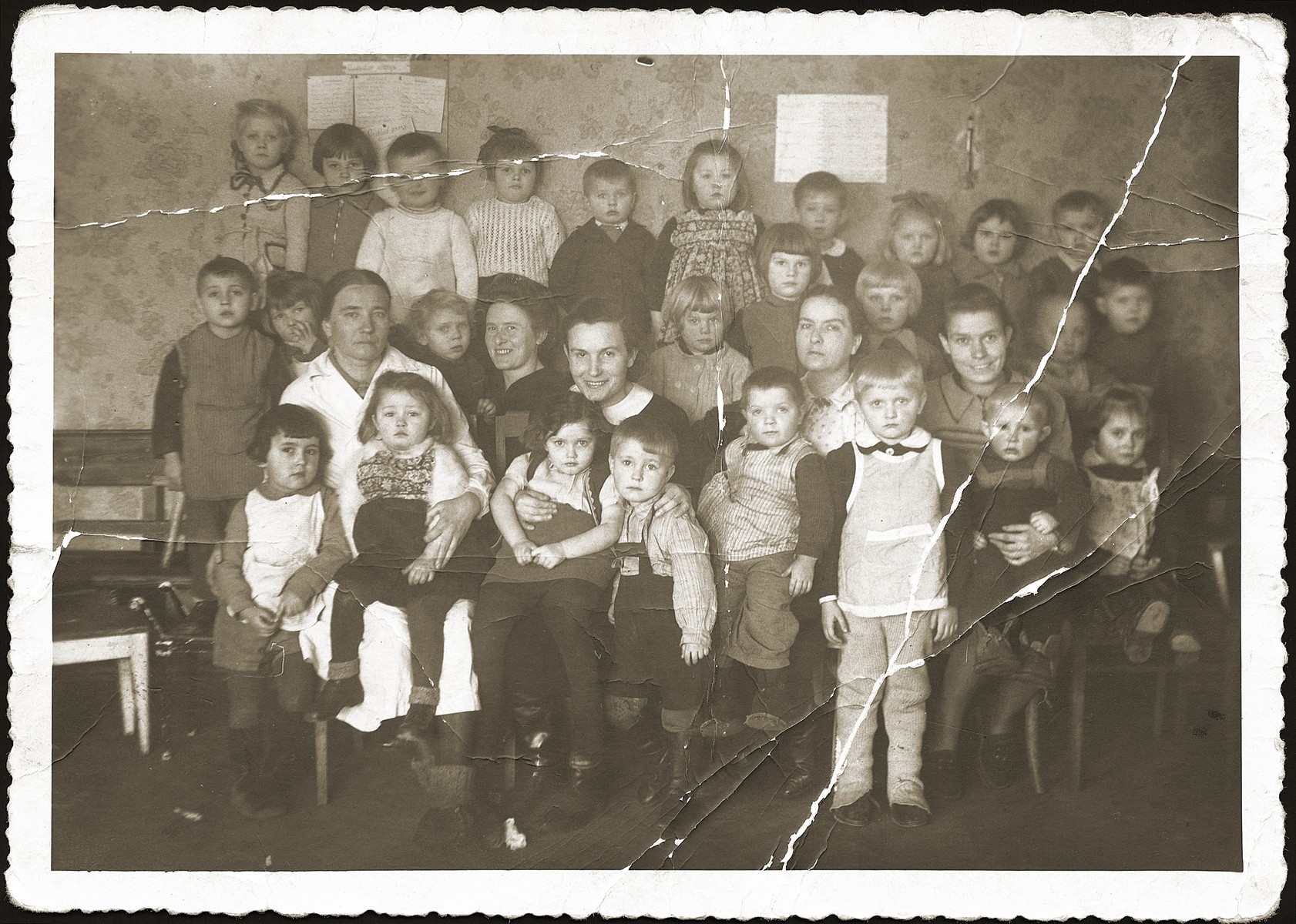 Group portrait of teachers and pupils of a Polish kindergarten in Bialystok.  

Among those pictured is Anna Strzelczyk (front row, third from the left).