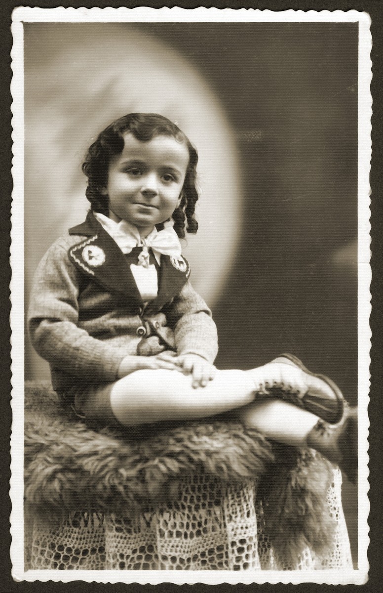 Studio portrait of a Jewish child in Bedzin, Poland.

Pictured is 3-year-old Monius Einesman, a cousin of Fela Fiszel.  Monius perished in Auschwitz.
