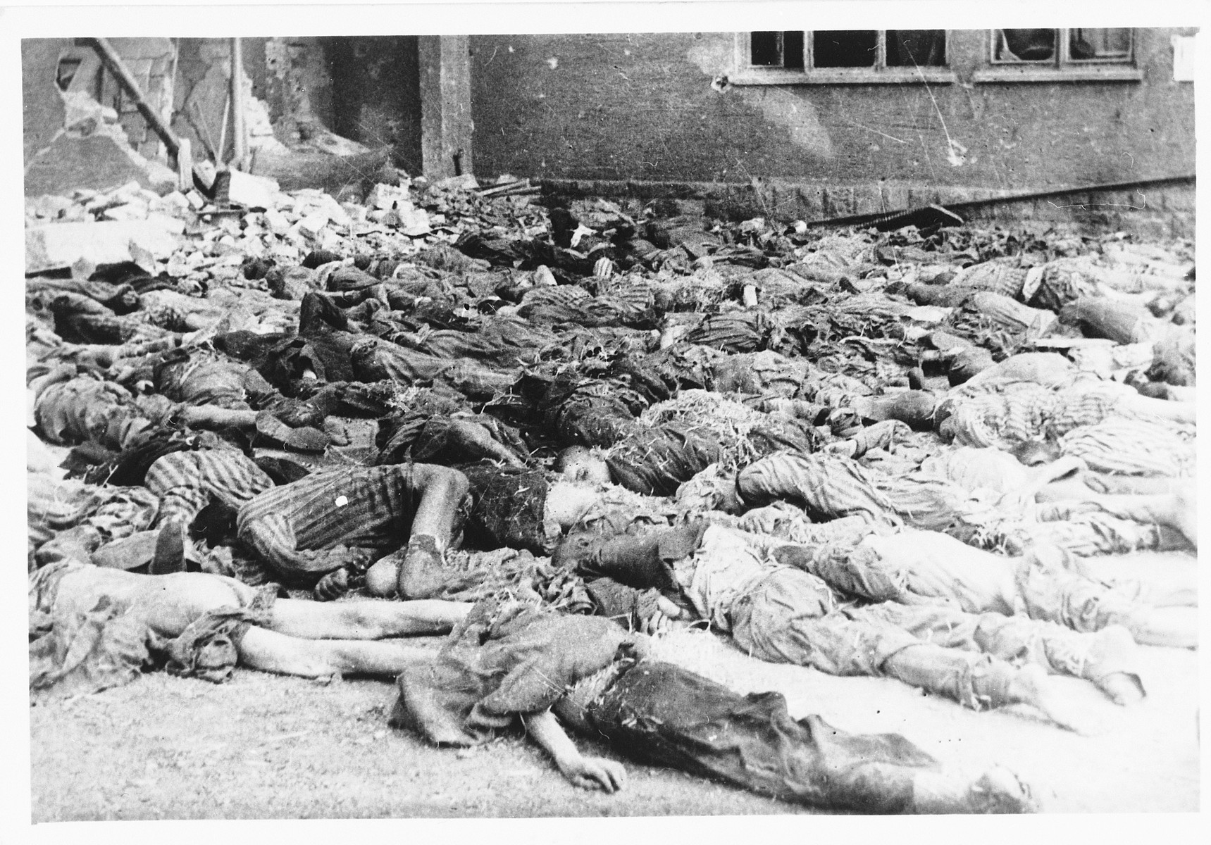 View of corpses lying on the ground of the Nordhausen concentration camp following liberation.