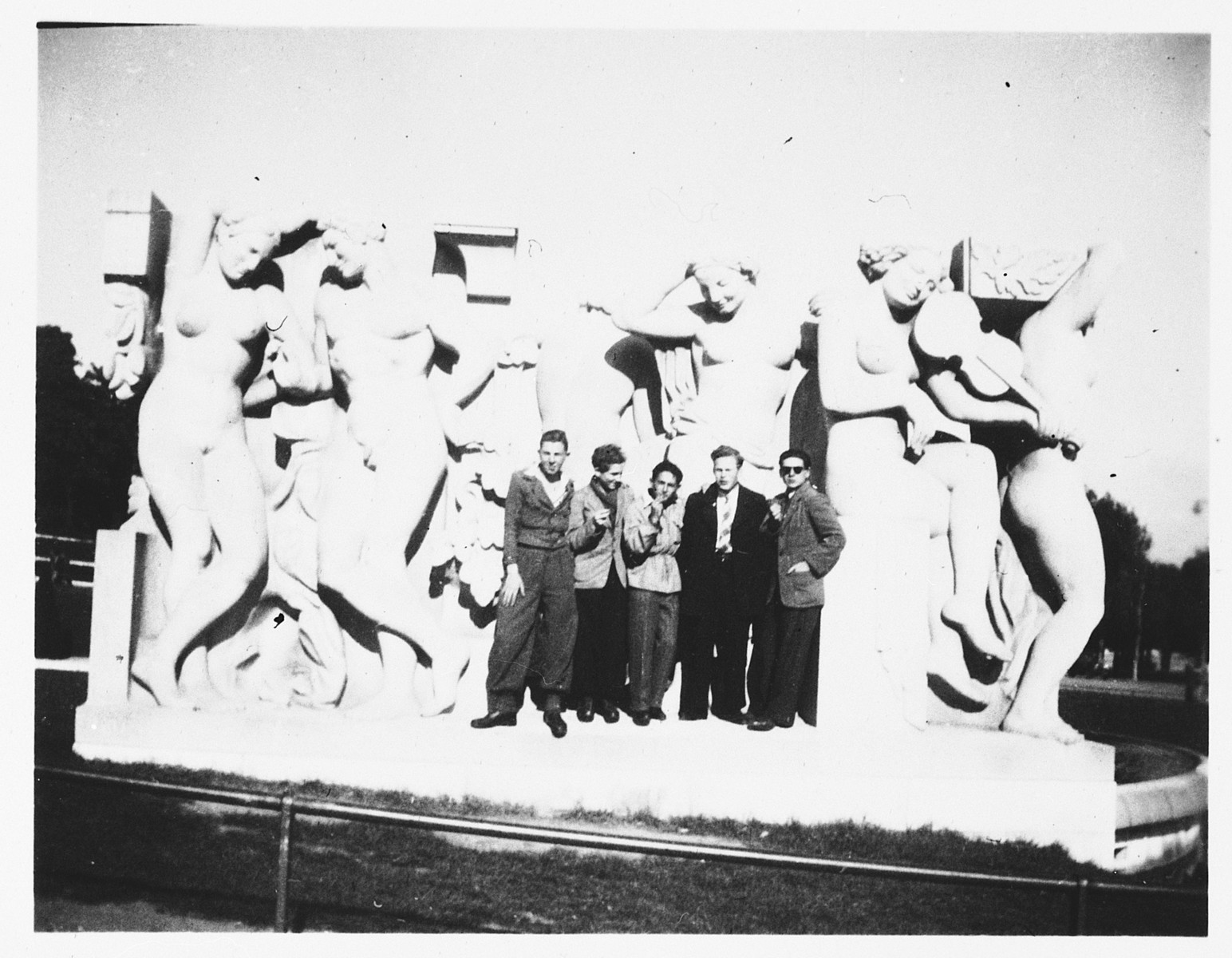 Teenagers from the rue Rollin youth home pose in front of a statue in Paris.

Among those pictured are Herbert Karliner and Lutz Scheucher.
