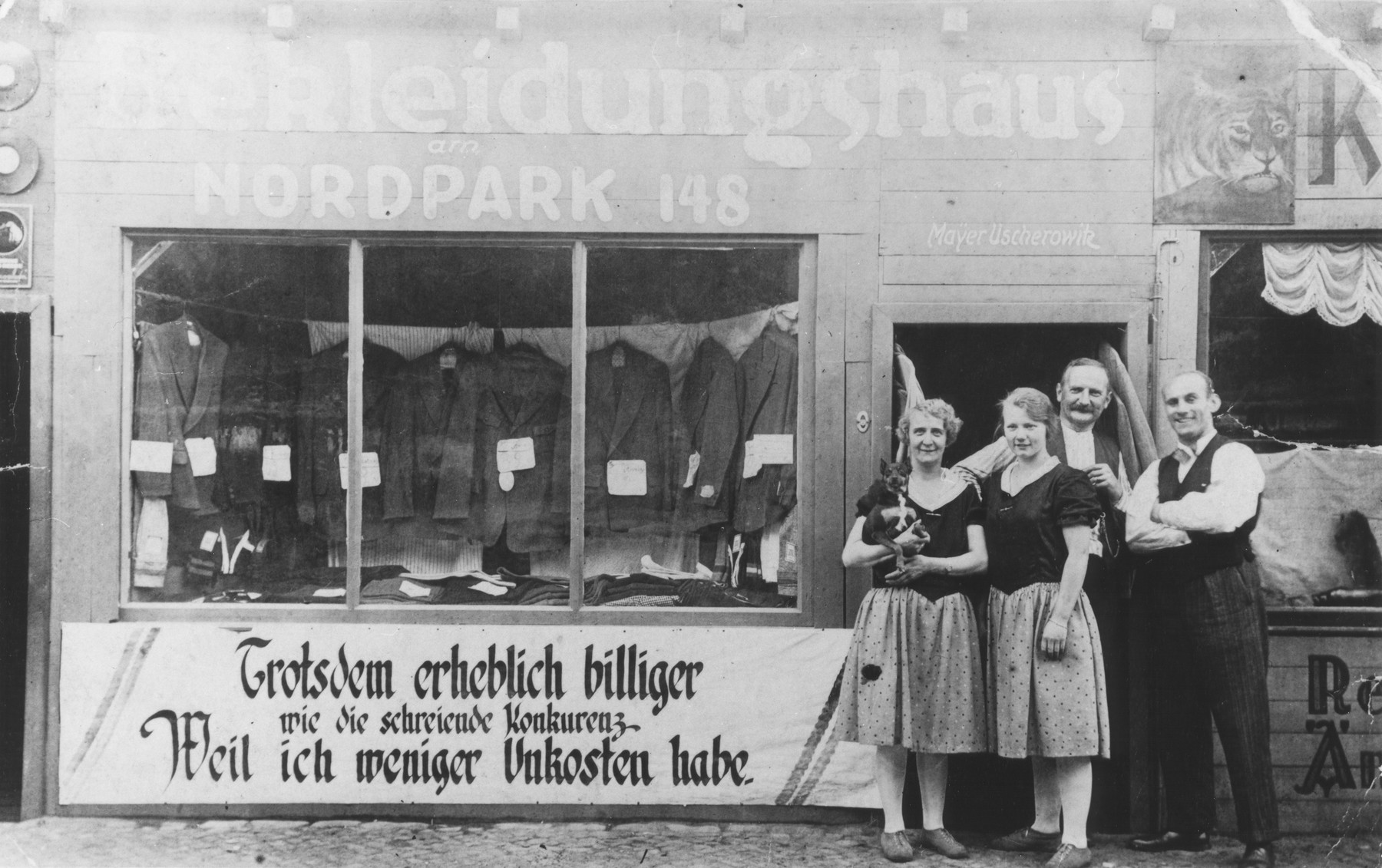 Kajla and Jakob Uszerowicz and another couple stand outside their clothing store in Berlin.