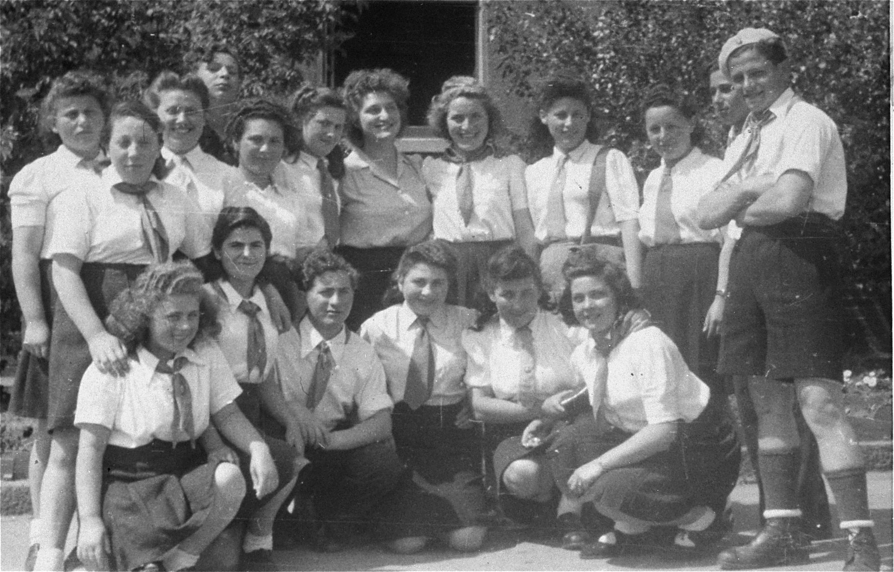Group portrait of high school students in the Bergen-Belsen displaced persons camp.  

Among those pictured is Rozia Merin (front row, far right).