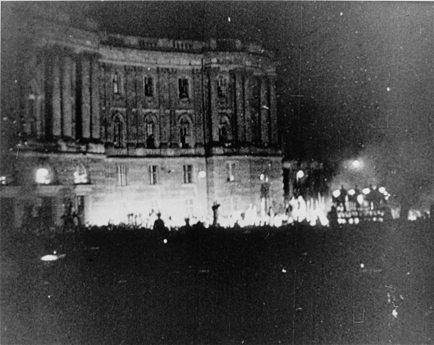 The public burning of "un-German" books by members of the SA and university students on the Opernplatz in Berlin. 

Still from a motion picture.